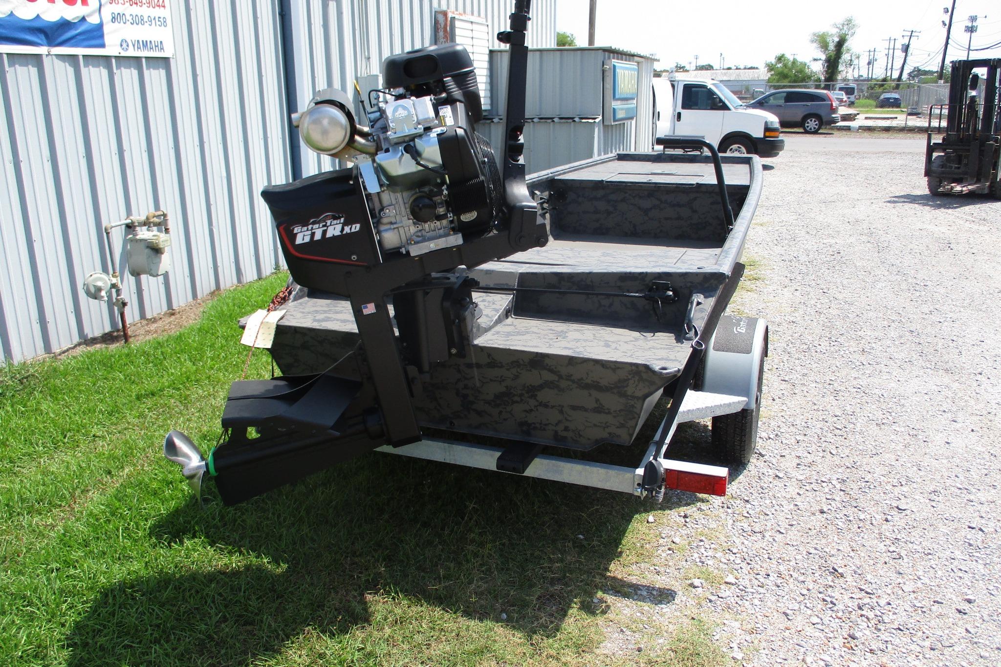 2026 Gator Tail 1754 Extreme boat with powerful motor, parked outdoors on grass.