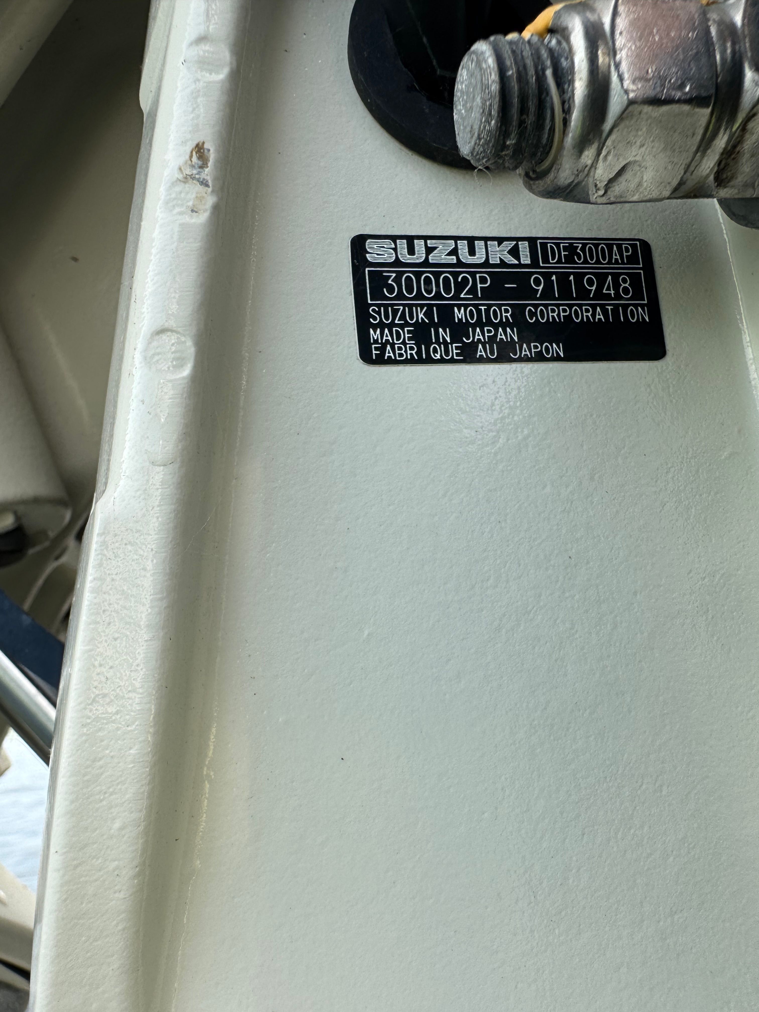 Suzuki DF300AP engine plate, made in Japan, on 2004 ShearWater LTZ.