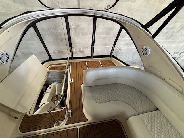 Interior of a 2004 Meridian 341 Sedan with elegant seating and wood flooring.