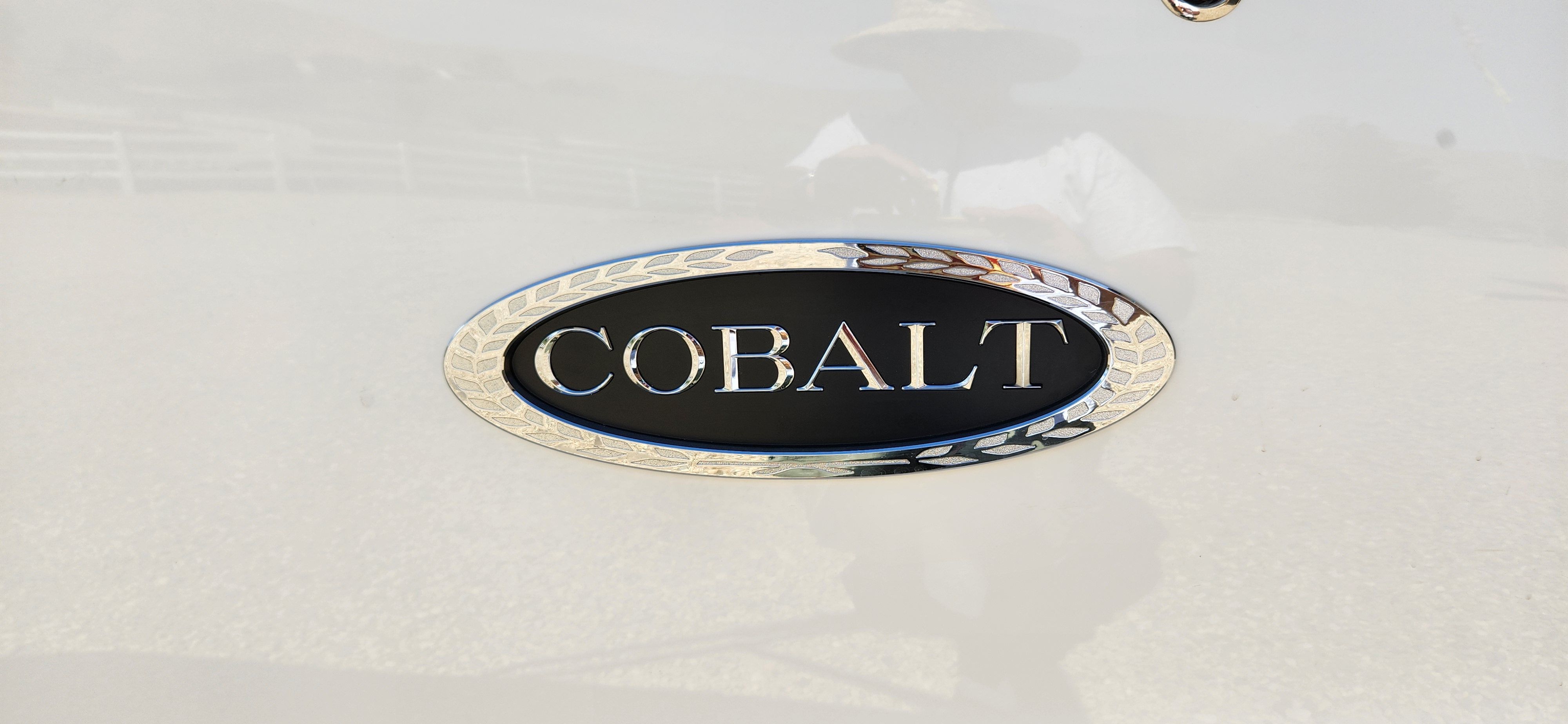 Close-up of the Cobalt logo on a boat.