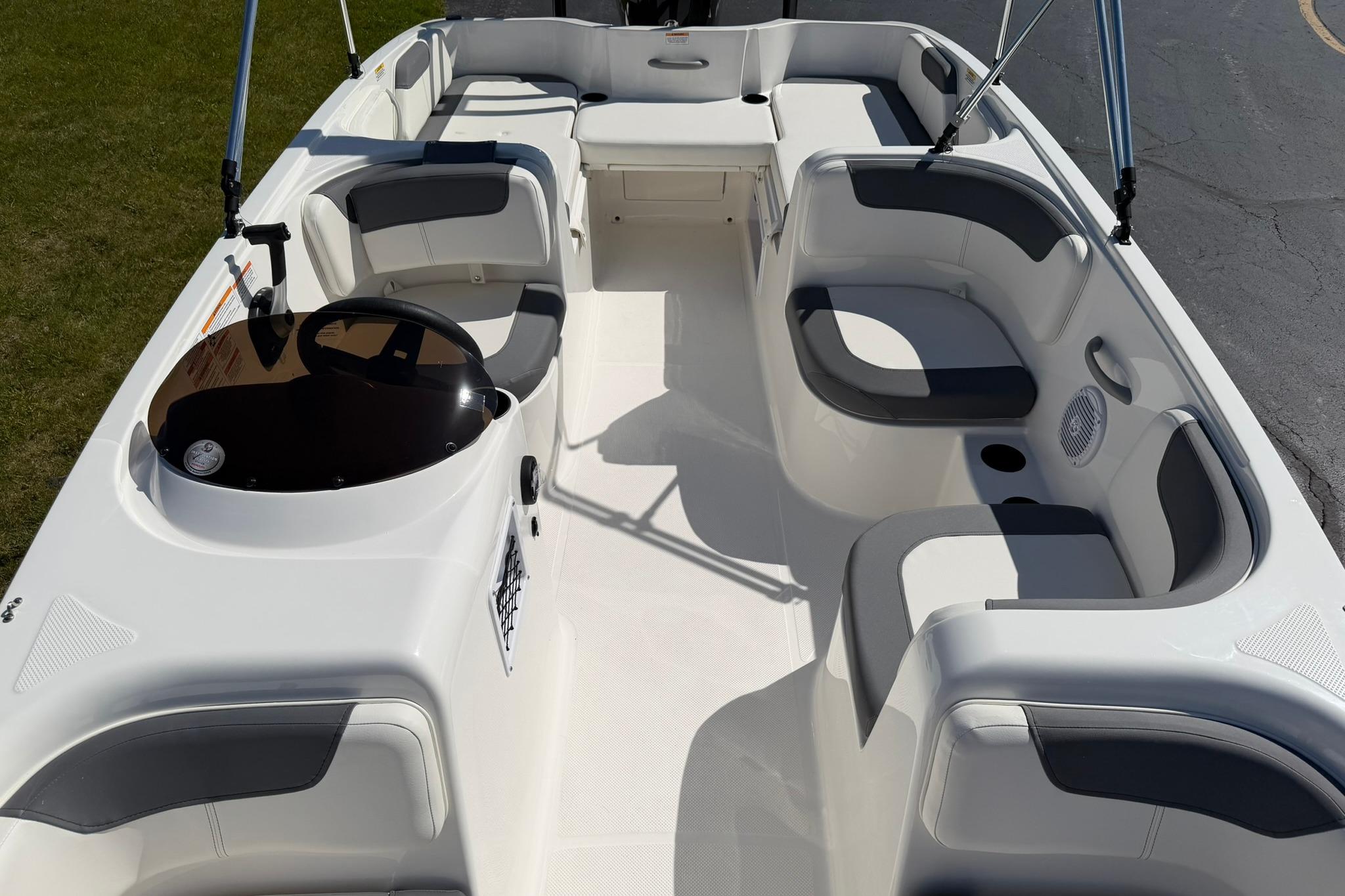 2026 Bayliner Element E18 boat interior with spacious seating and modern design.