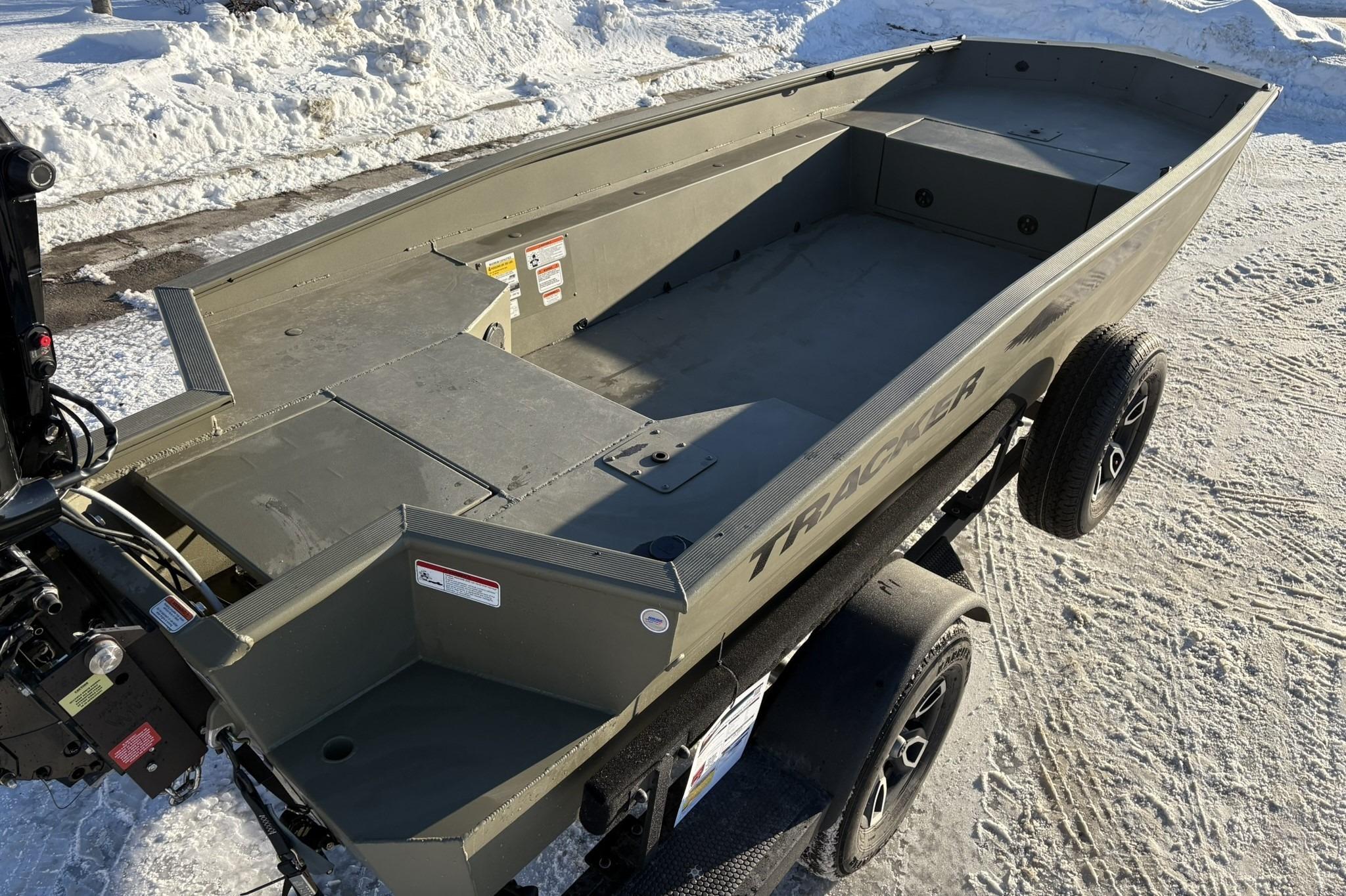 2025 Tracker Grizzly 1650 T Prairie Wings Edition boat on snowy ground.