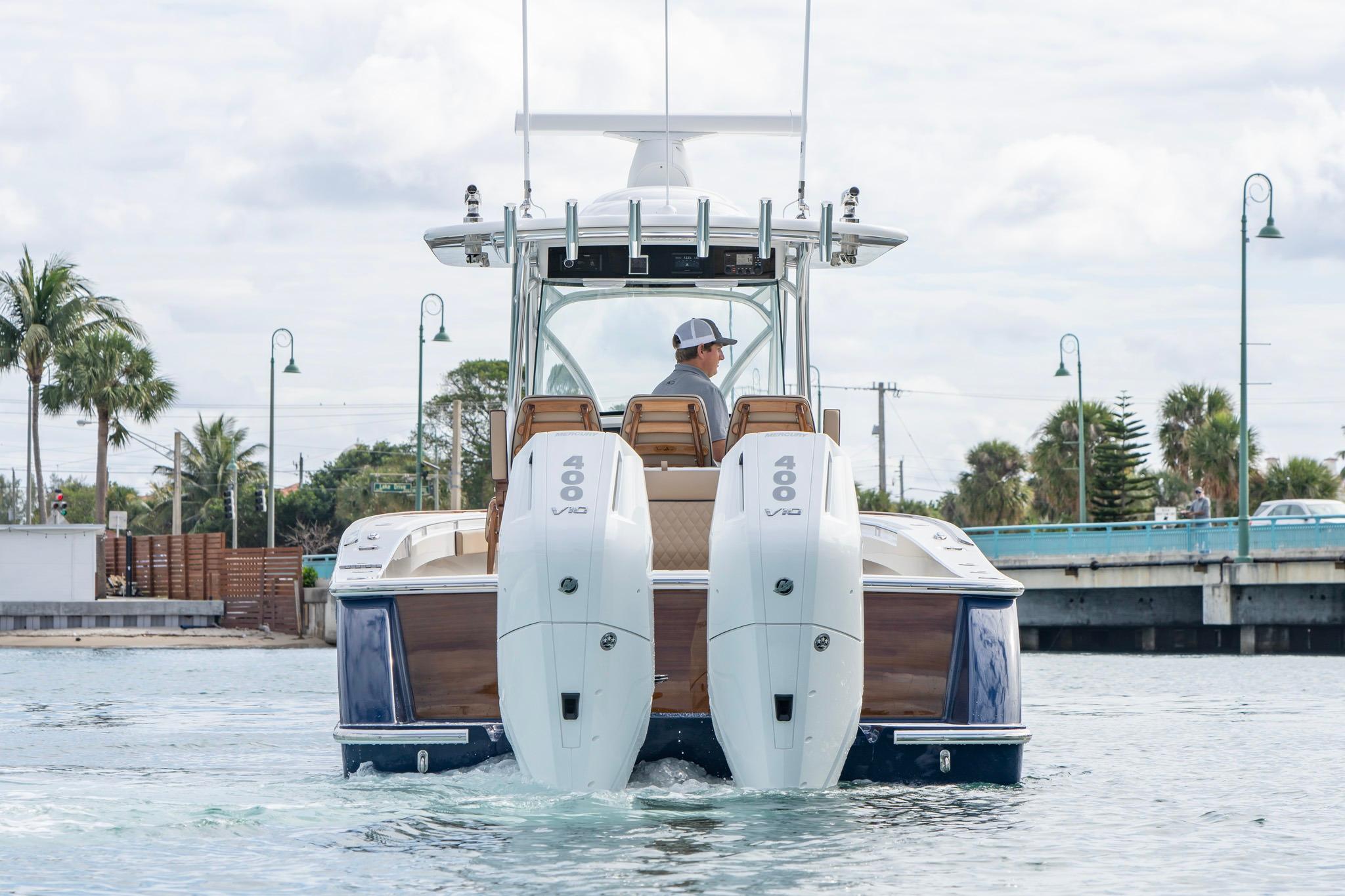 2026 Valhalla Boatworks V-33 with dual 400 V10 engines cruising on water.