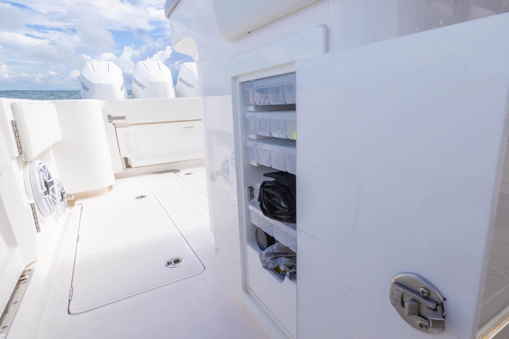 2024 Blackwater 43 Sportfish boat interior with storage compartments and Mercury engines.