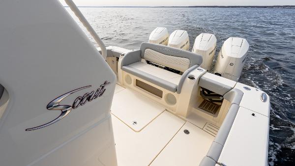 2025 Scout 425 LXF boat with quad engines on open water.