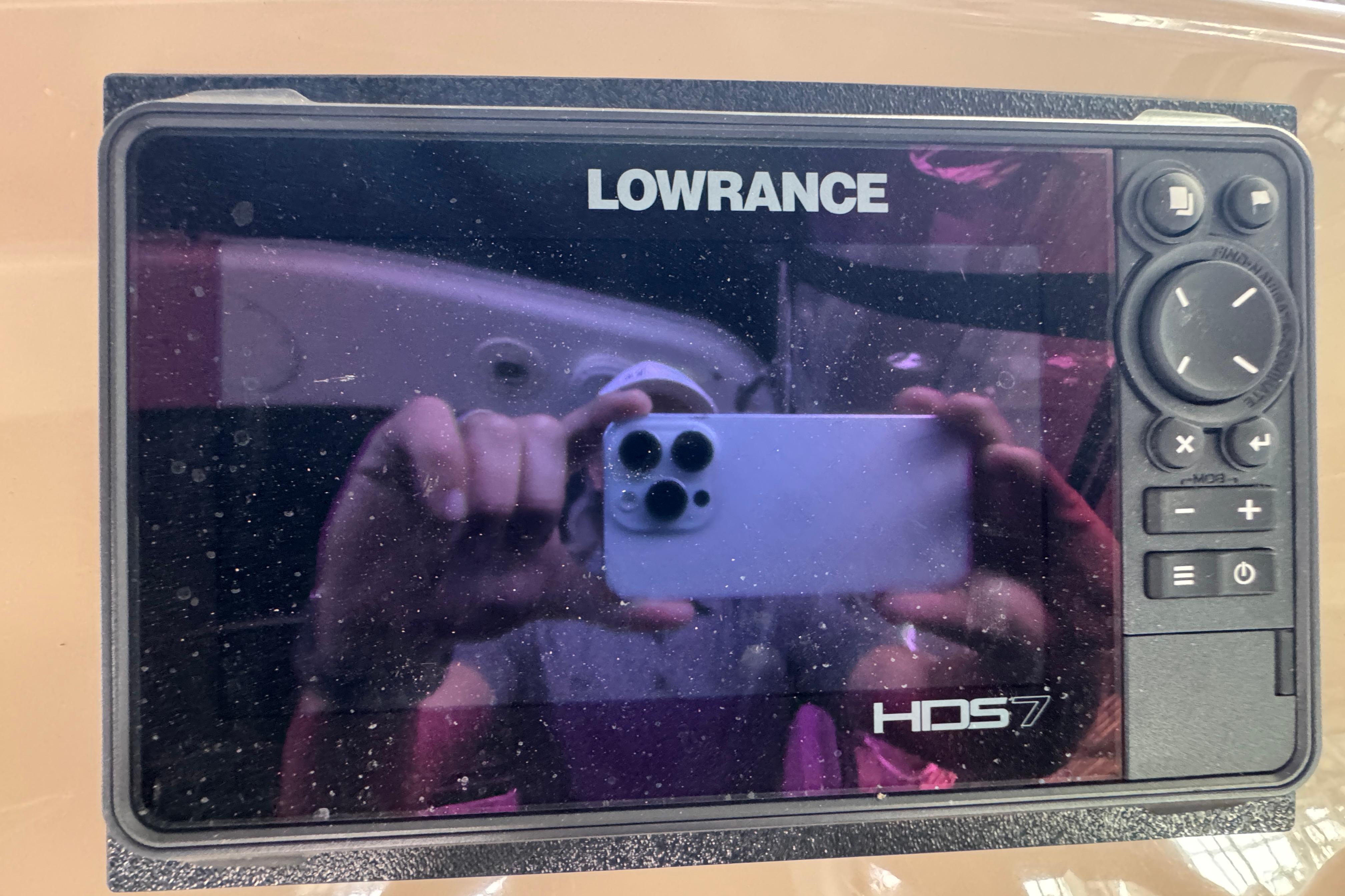 Lowrance HDS7 display on 2006 Chaparral 330 Signature boat dashboard.