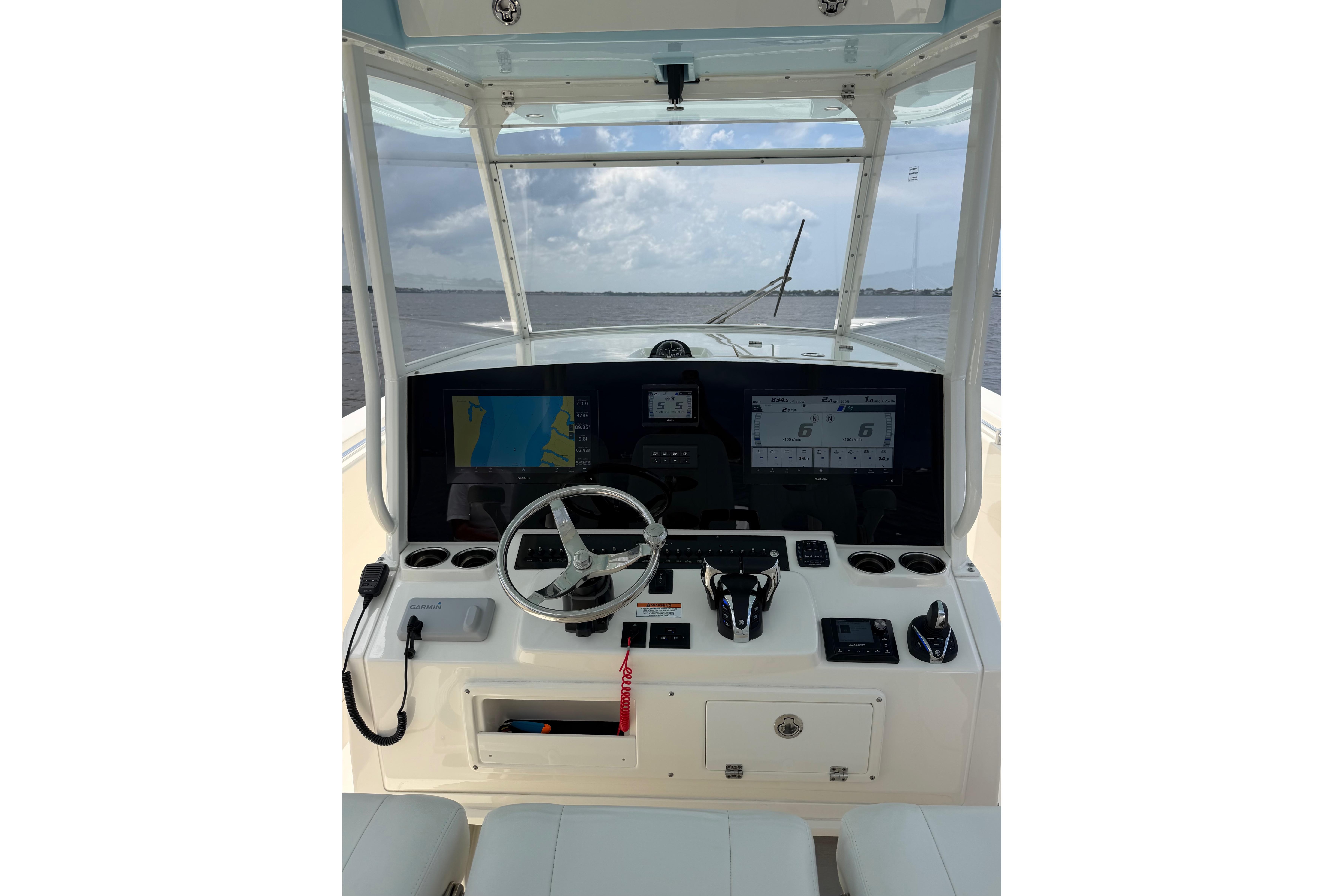 2023 Cobia 350 Center Console helm with advanced navigation displays and controls.