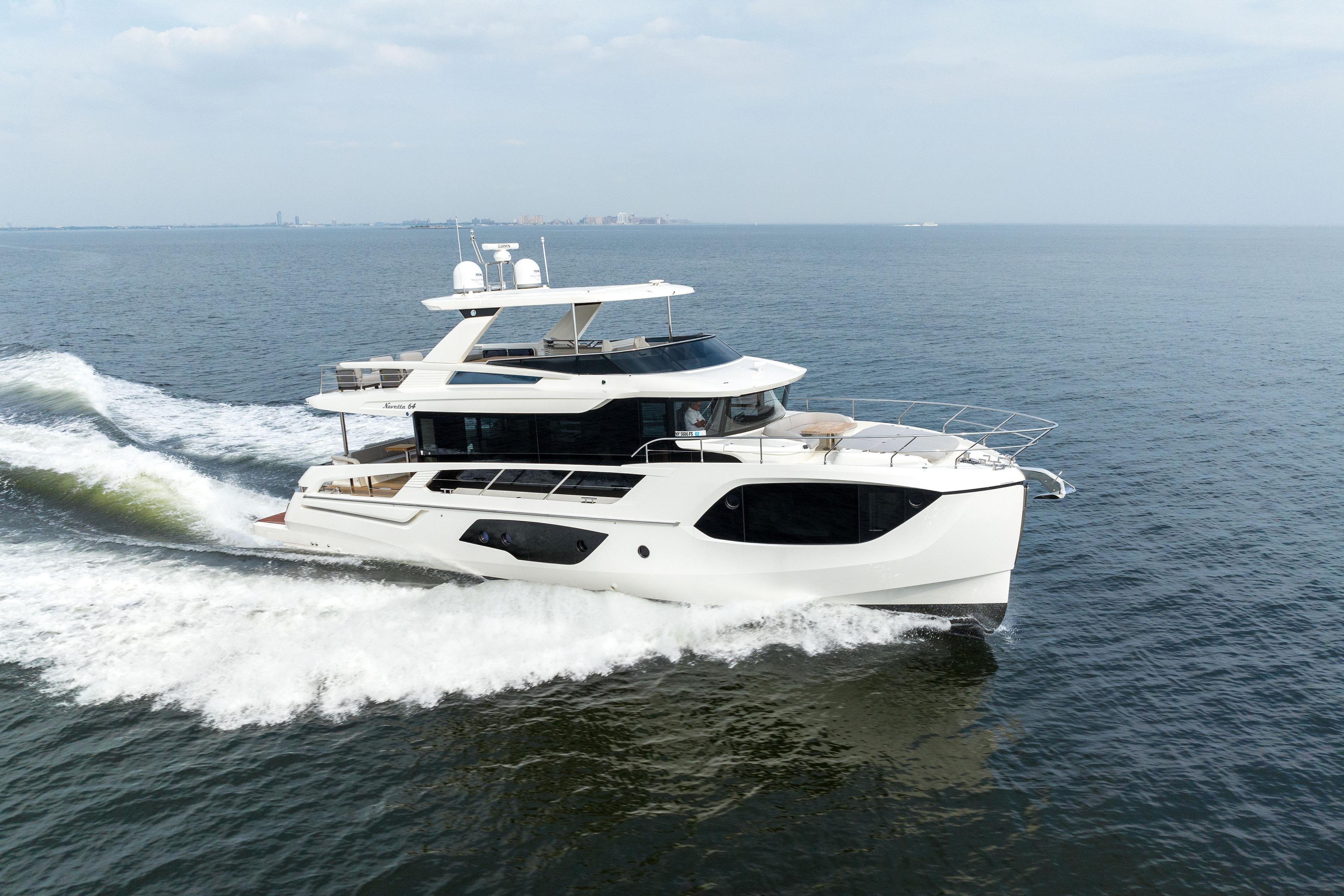 2024 Absolute Navetta 64 yacht cruising on open water.