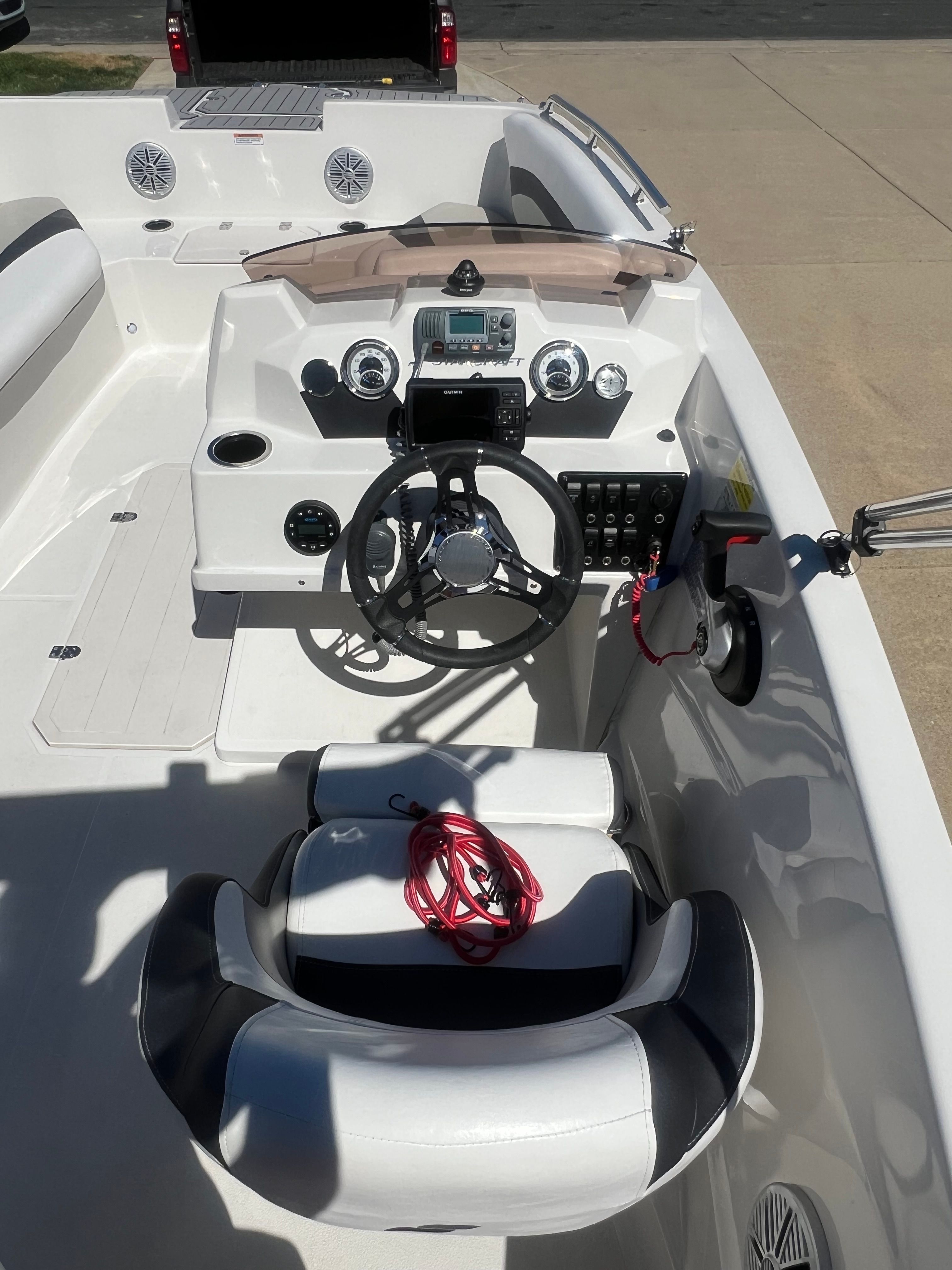 Interior view of 2023 Starcraft SVX 171 OB boat cockpit.