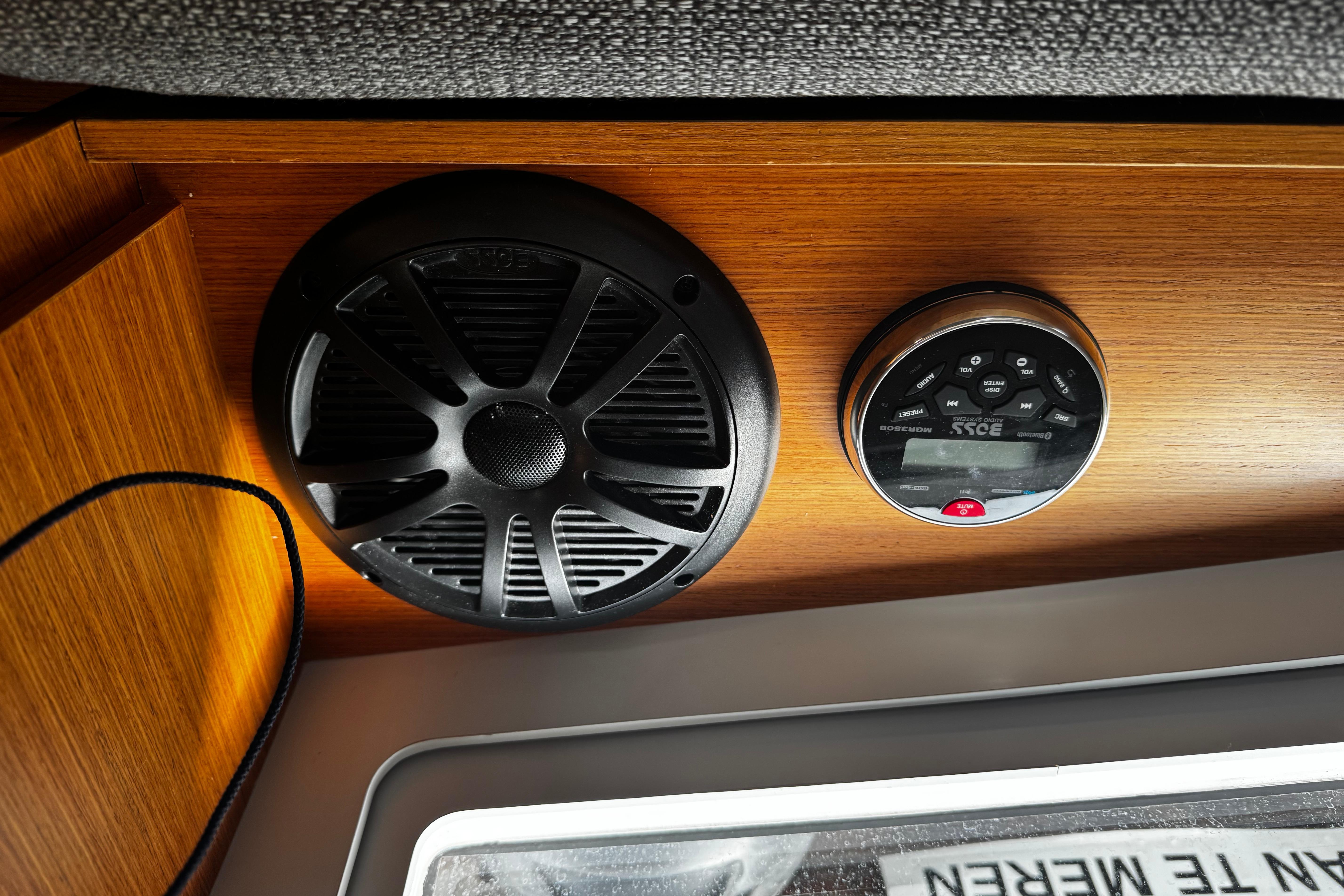 Speaker and control panel inside 2022 Dufour 32 yacht cabin.