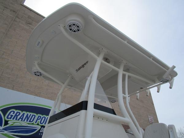 2024 Ranger 2360 Bay boat with T-top and speakers at Grand Pointe Marina.
