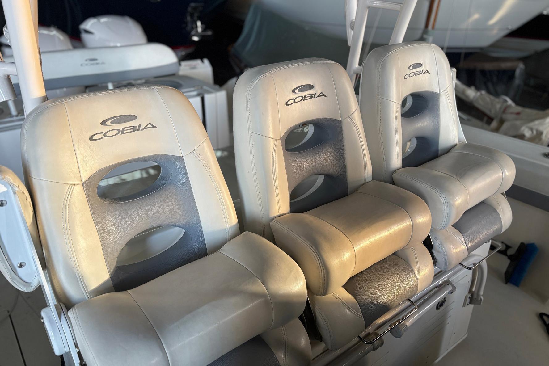 2018 Cobia 344 Center Console boat seats, featuring premium leather upholstery.