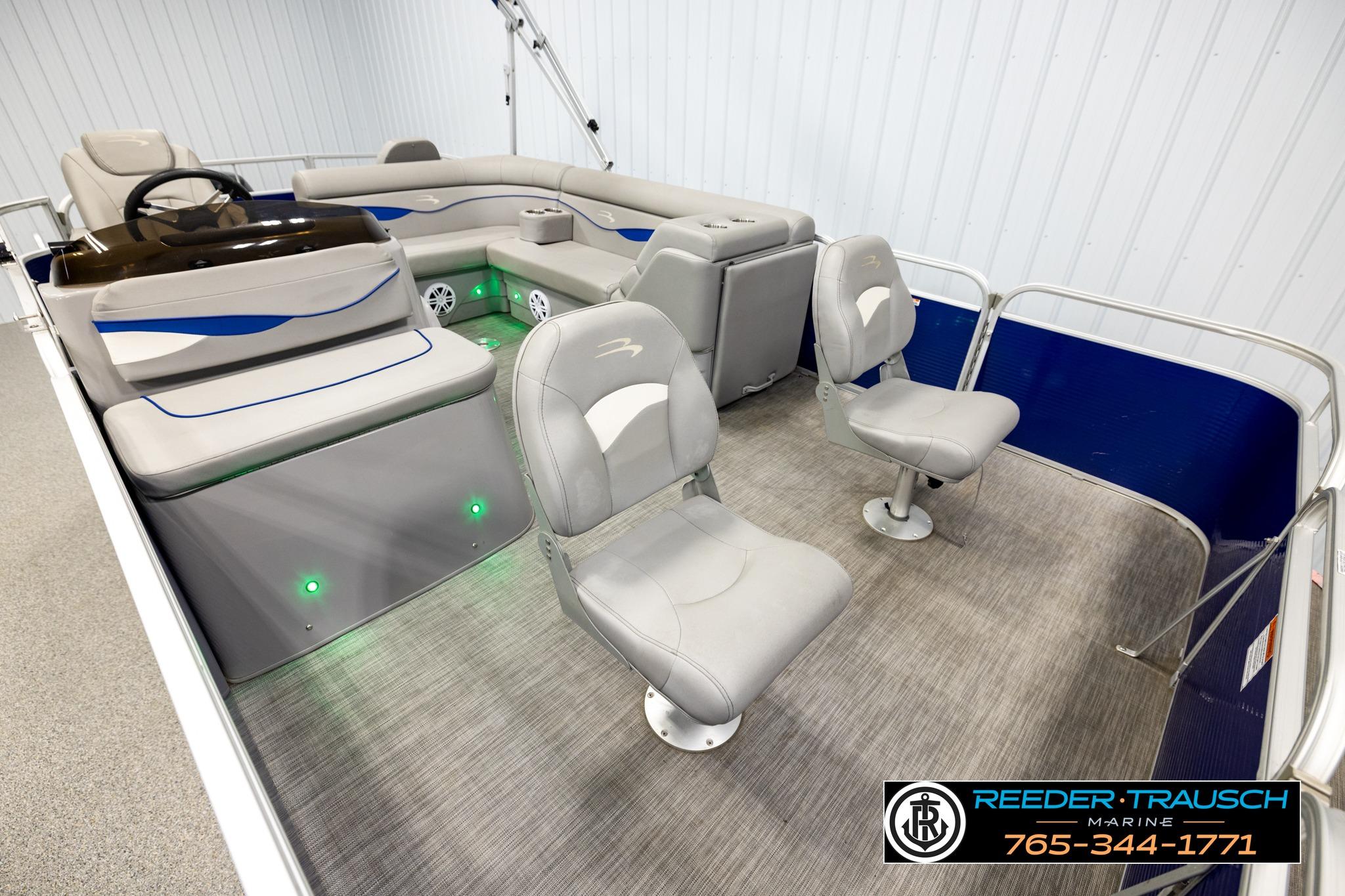 2021 Bennington 20 SV pontoon boat interior with gray seating and modern design.