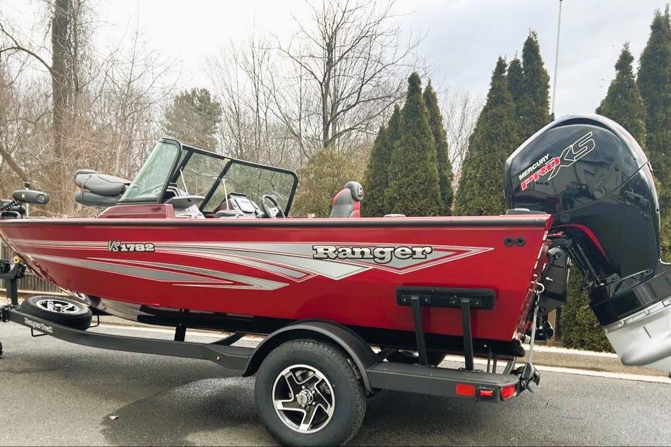 2026 Ranger VS1782SC Reata boat in red, on a trailer, with Mercury Pro XS engine.
