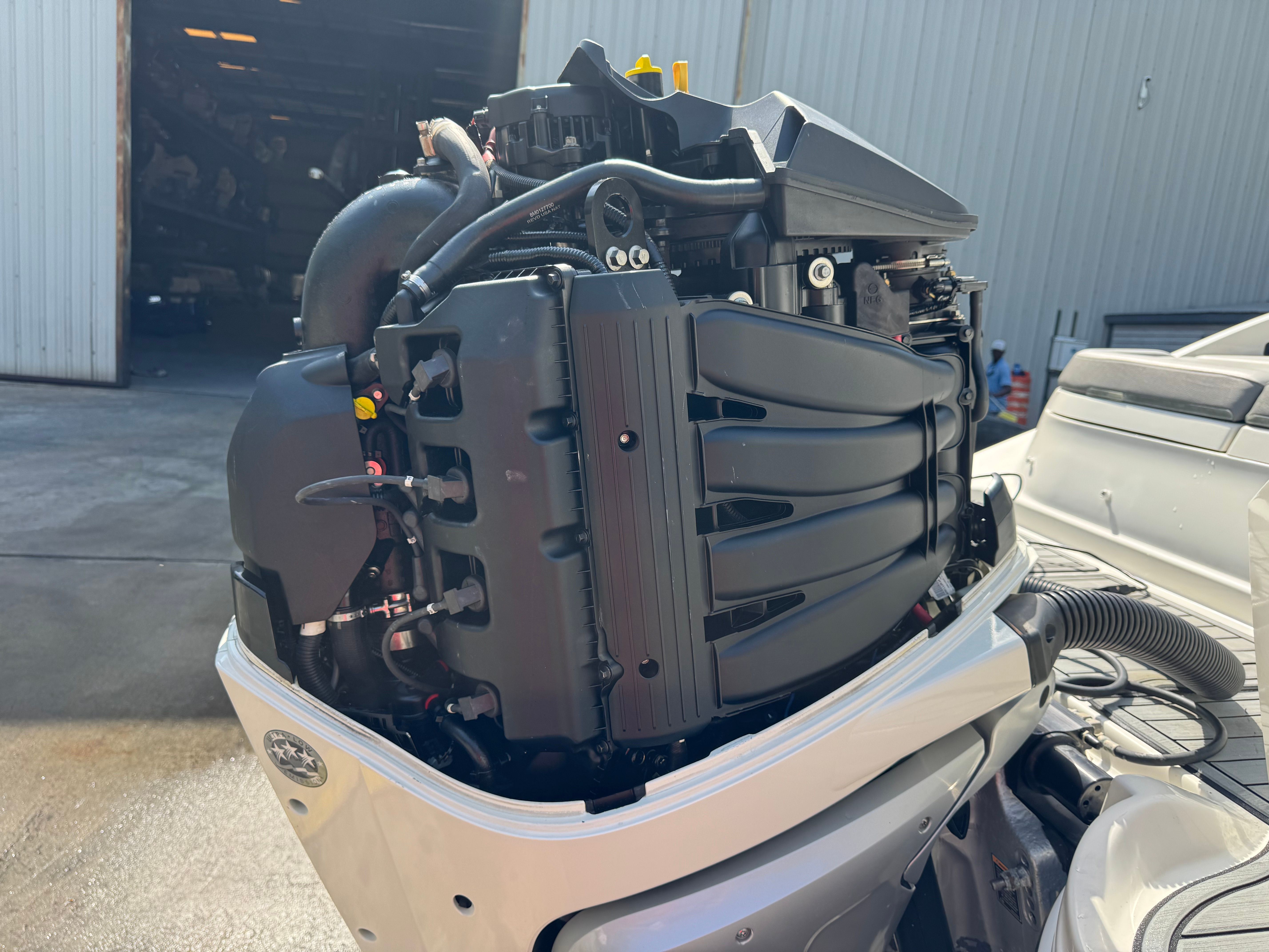 2020 Sea Ray SDX 270 outboard motor in workshop.