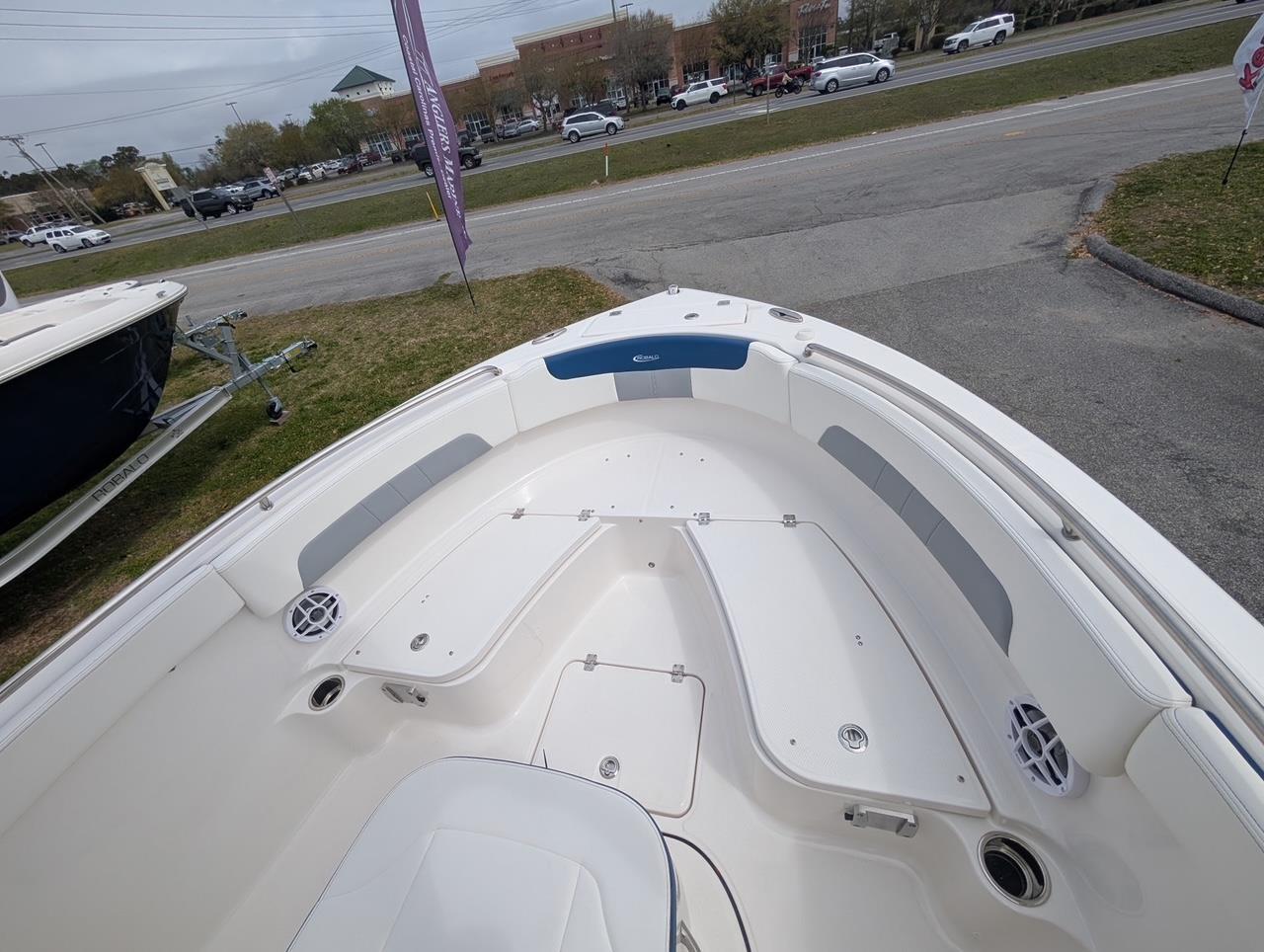2025 Robalo R222 Explorer boat interior with seating and storage compartments.