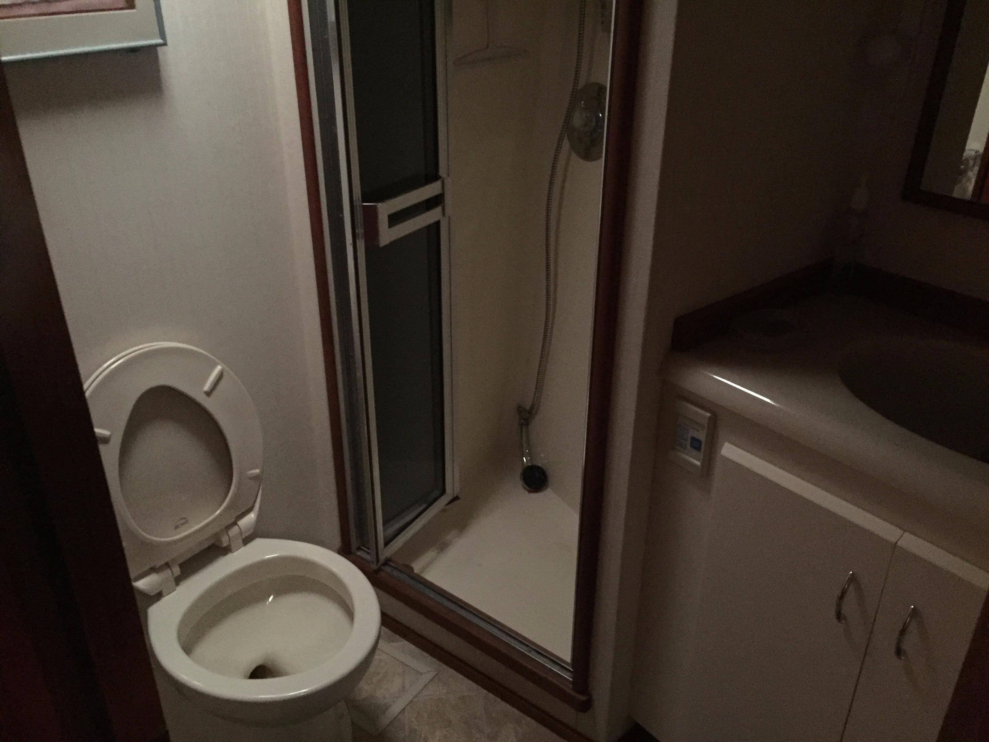 Bathroom in 1989 Viking 41 Sportfish Convertible boat.