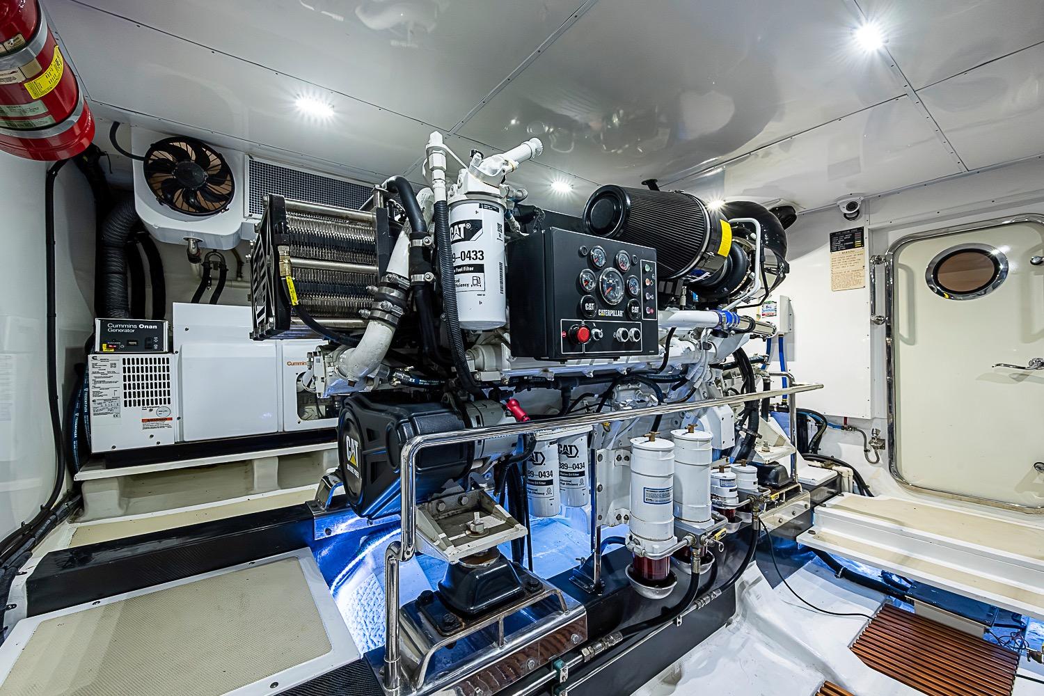 Engine room of 2014 Marlow 80 Explorer yacht, featuring advanced machinery and equipment.