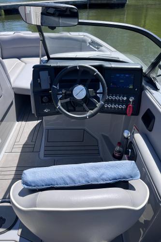 2024 Moomba Max boat interior with steering wheel and dashboard controls.