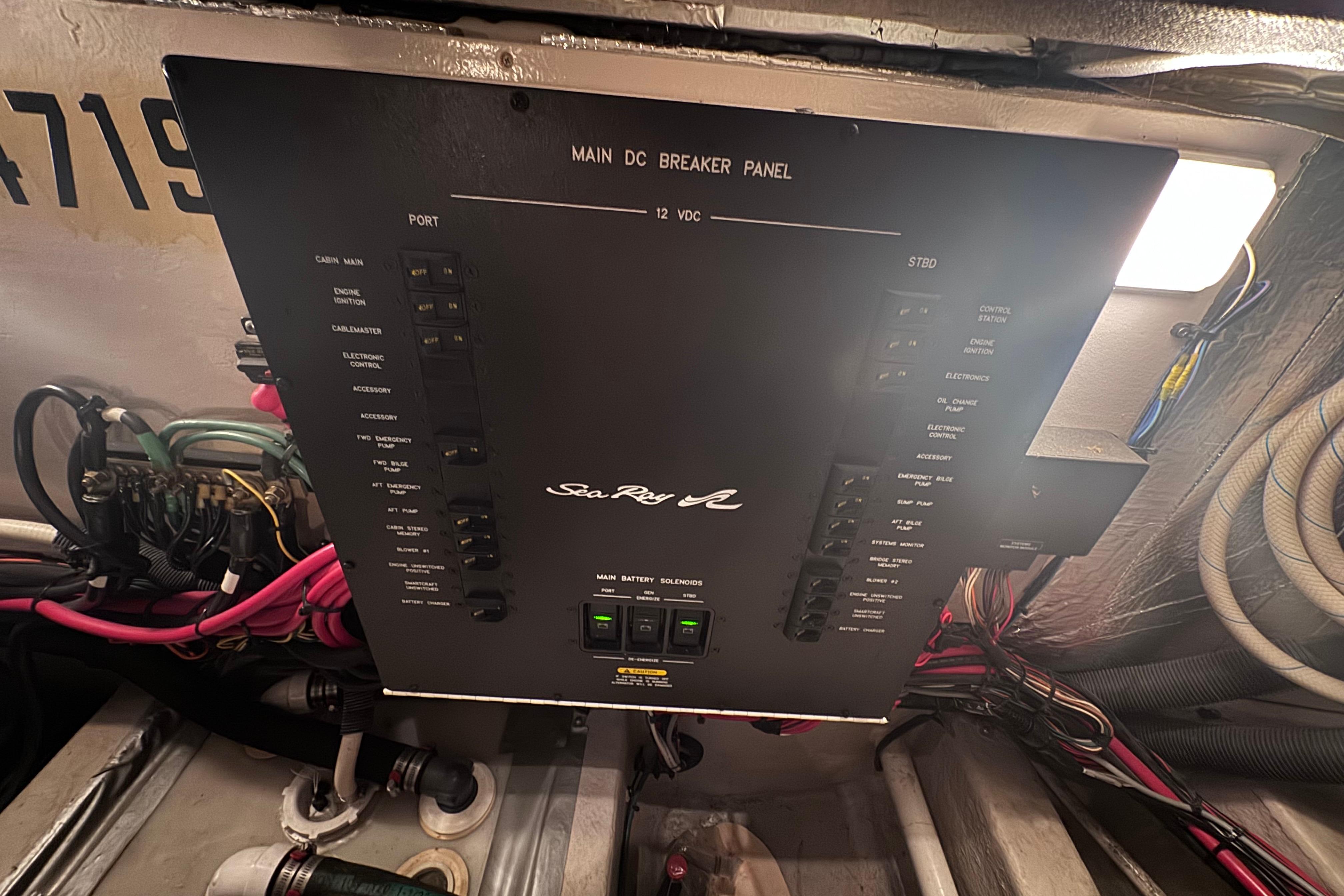 Main DC breaker panel of 2004 Sea Ray 390 Motor Yacht, featuring various electrical controls.