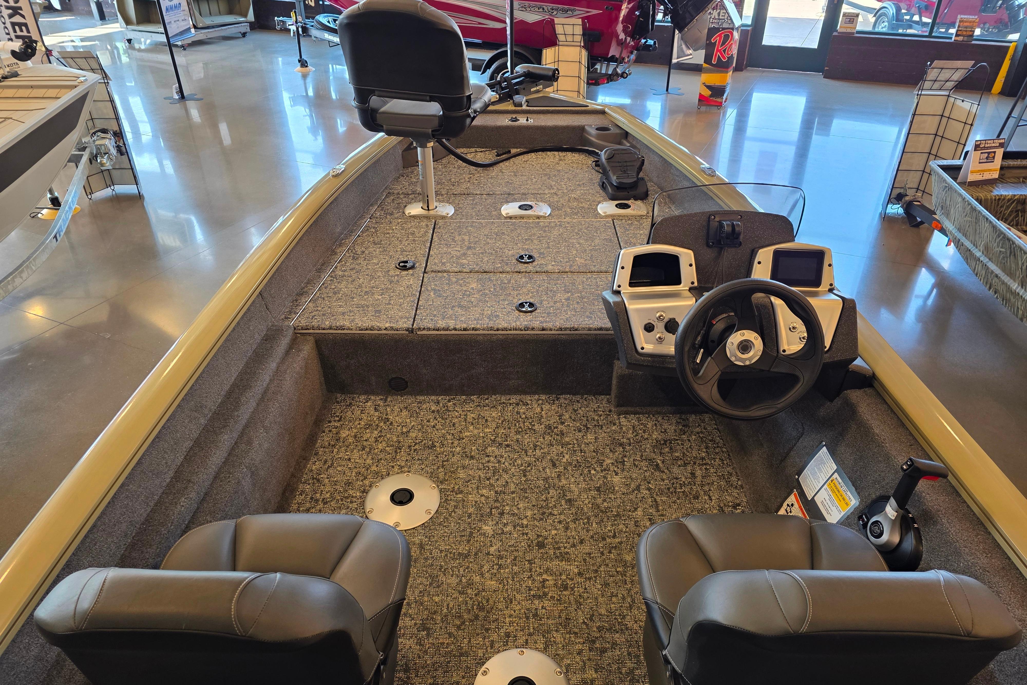 2026 Tracker Pro Team 175 Crappie Edition boat interior with steering wheel and seating.