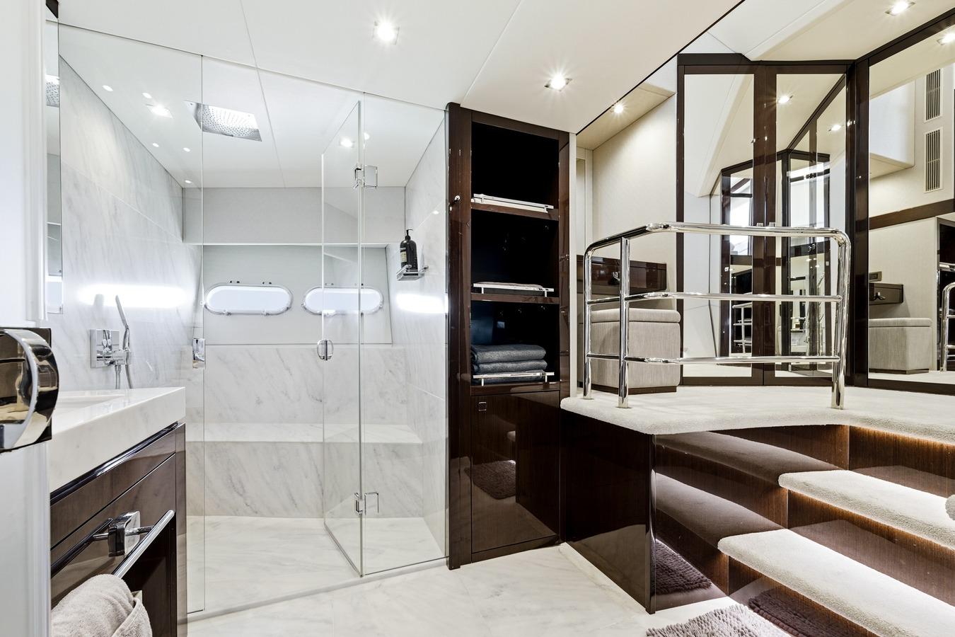 Luxurious bathroom in 2022 Sunseeker Motoryacht with glass shower and elegant design.