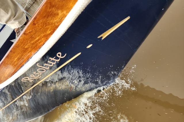 Bristol 45.5 Center Cockpit sailboat named "Resolute" cutting through water, 1984 model.