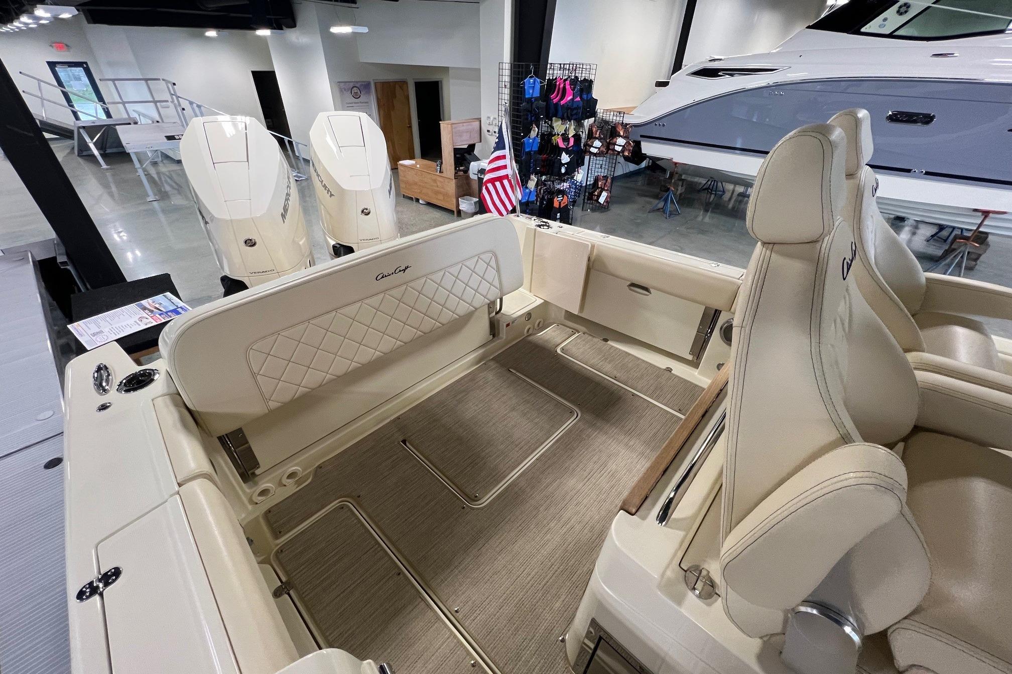 2025 Chris-Craft Catalina 30 interior with luxurious seating and dual Mercury engines.