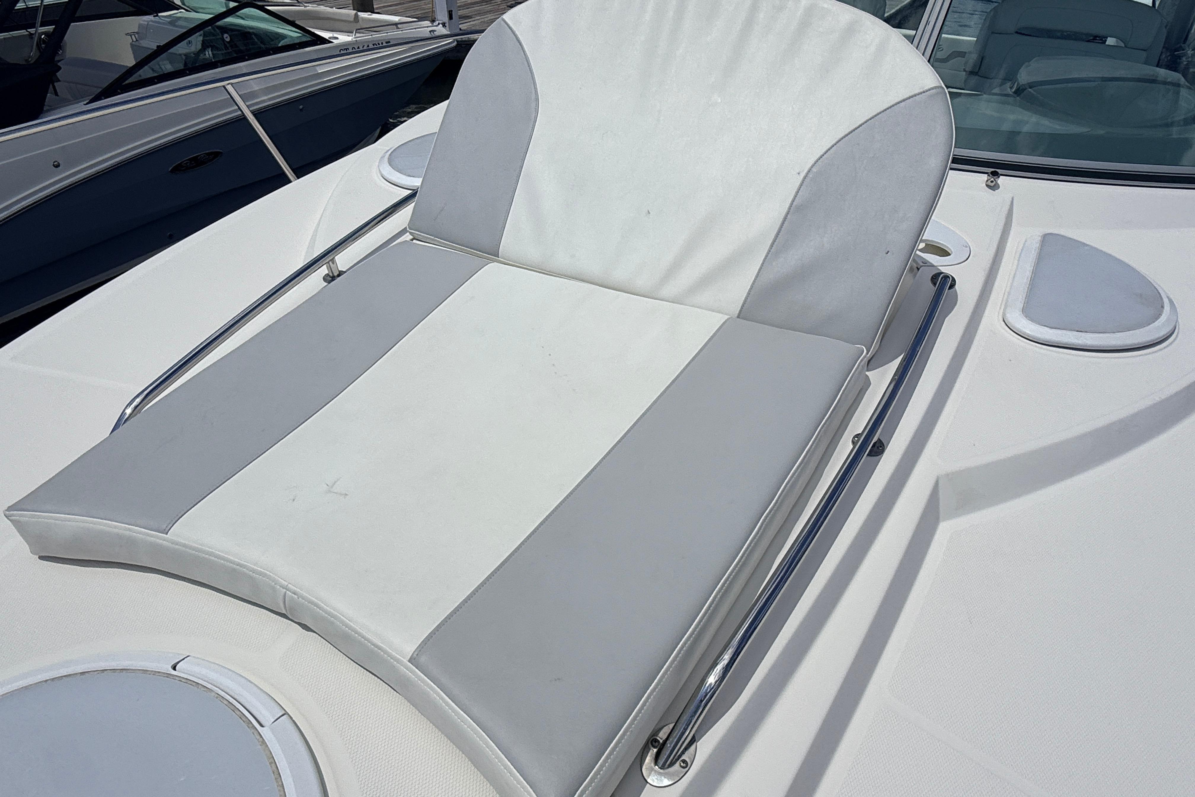 Sunpad on 2011 Monterey 320 Sport Yacht, featuring sleek design and comfortable seating.