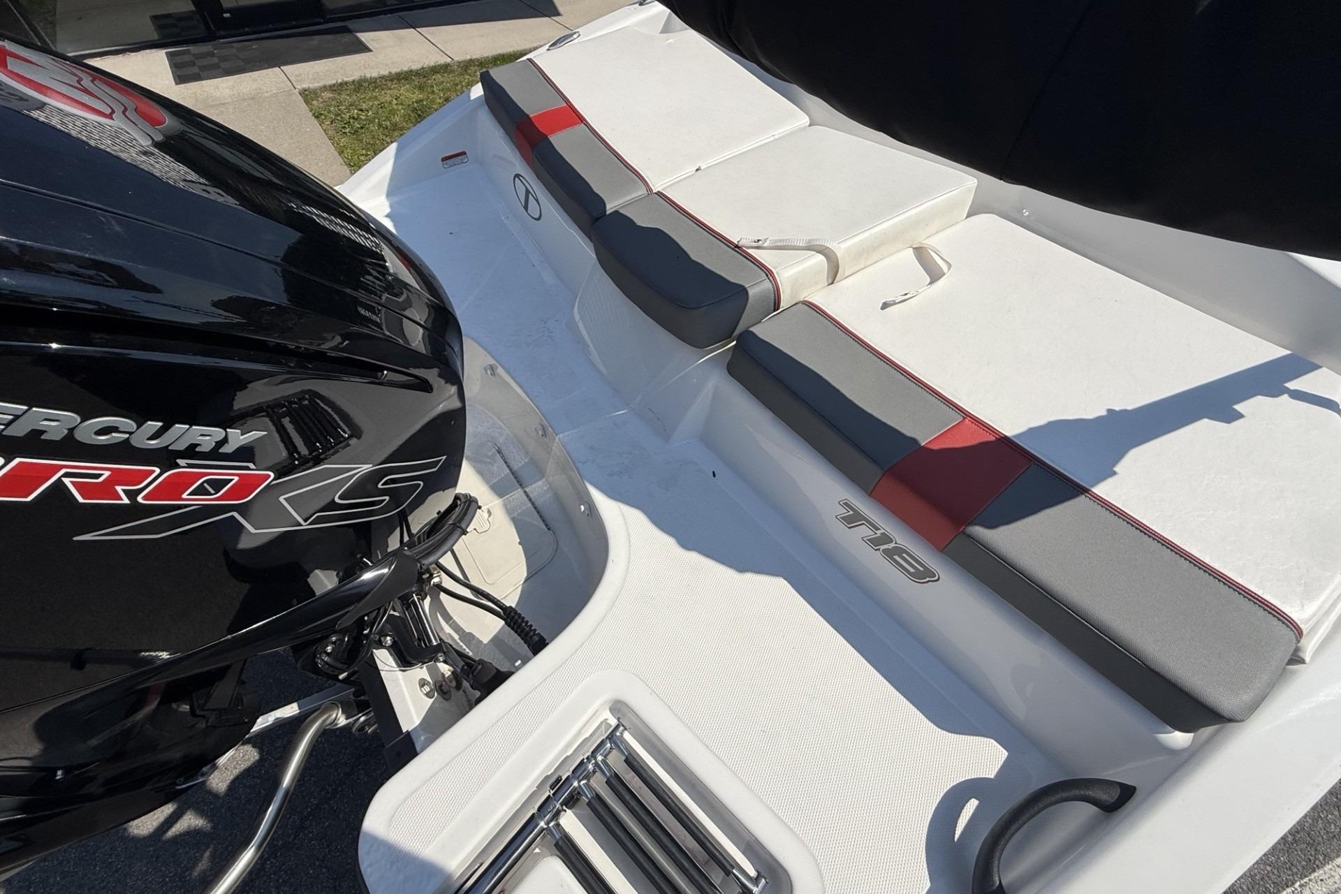 2024 Tahoe T18 boat with Mercury Pro XS engine, featuring sleek seating and modern design.