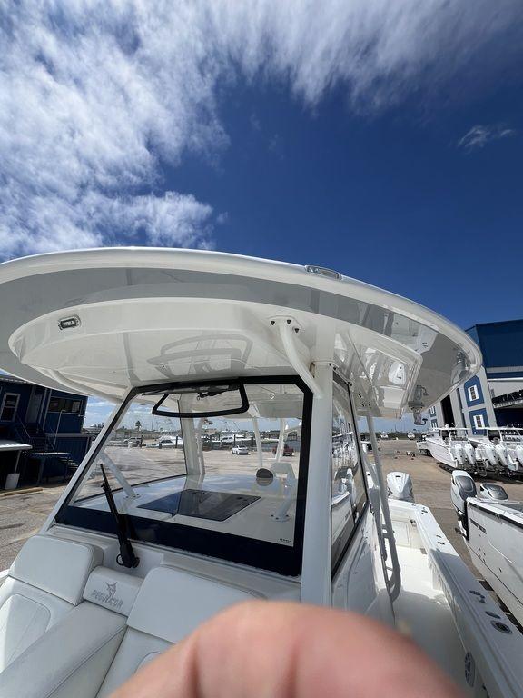 Regulator 41 boat 2021, top view, blue sky background.