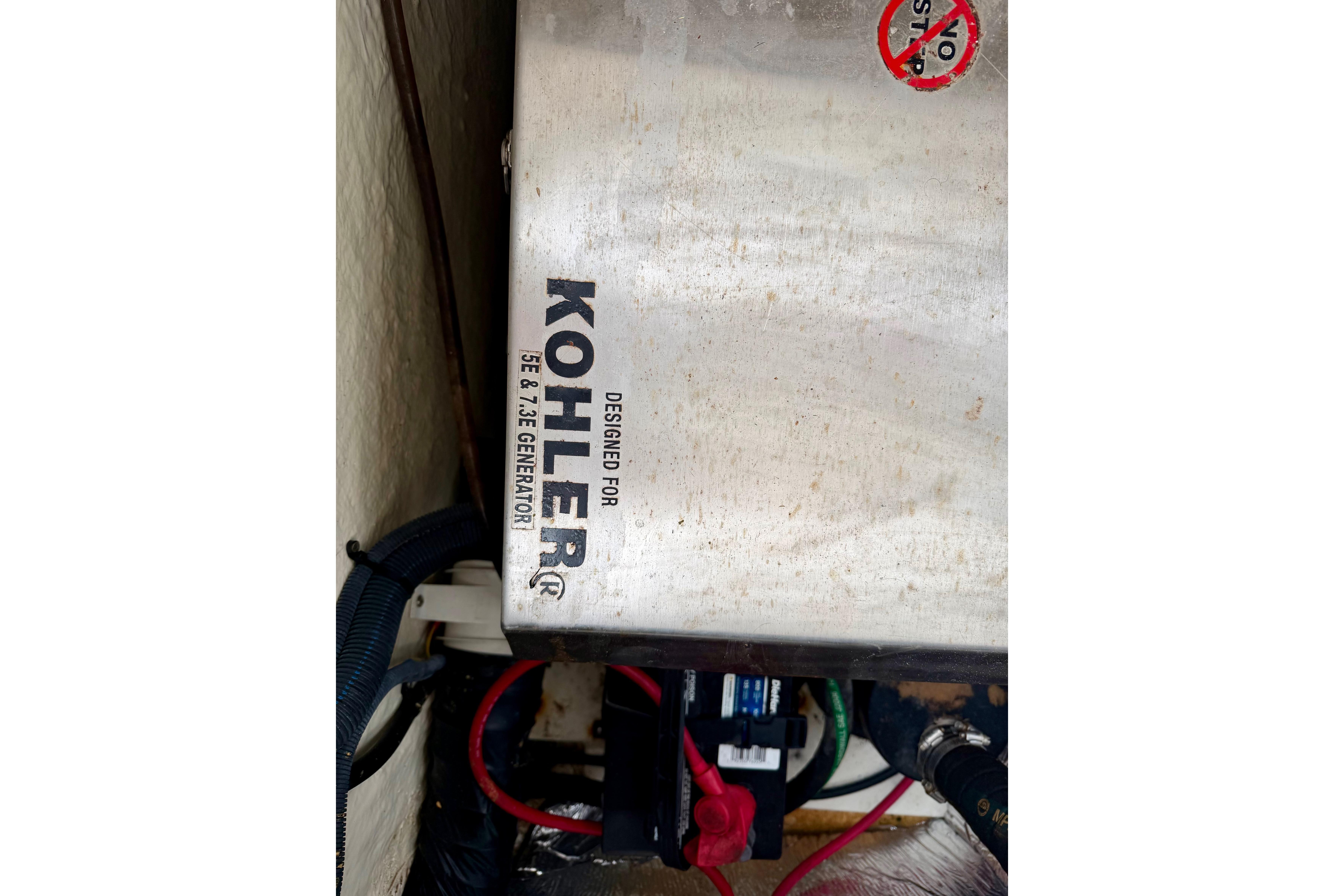 Kohler generator in 2006 Seaswirl Striper 2901 Walkaround O/B boat engine compartment.