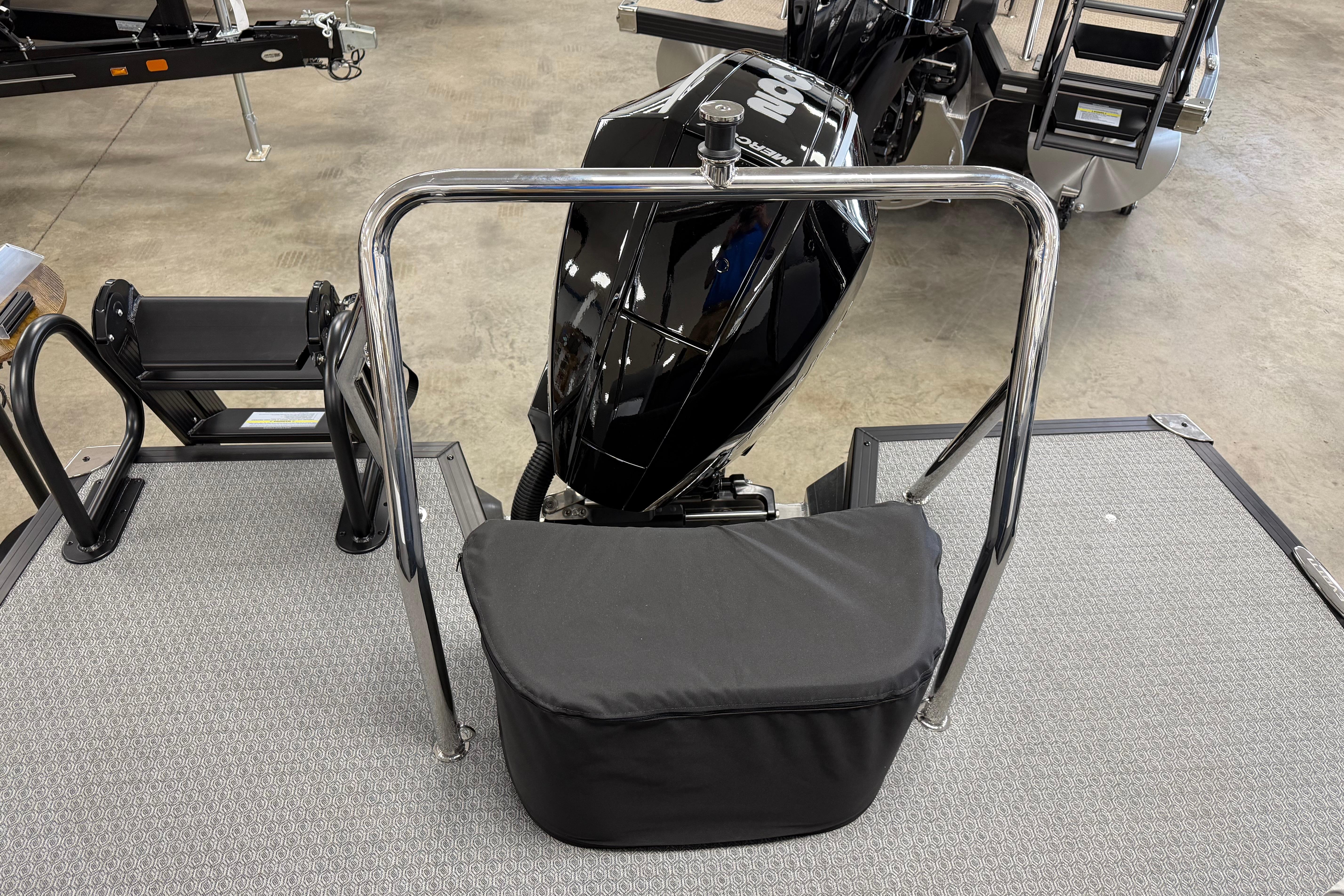 2026 Evotti 523QL boat with sleek black motor and sturdy railing.