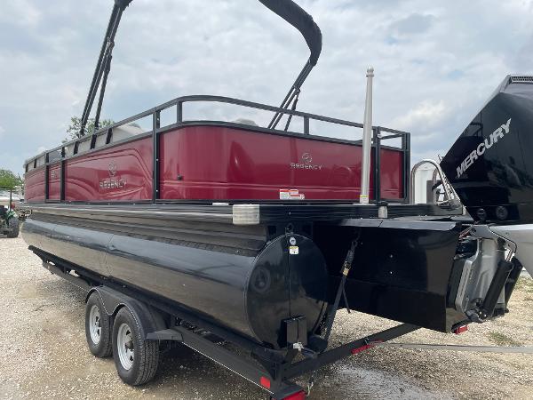 2023 Regency 250DL3 pontoon boat on trailer, featuring a sleek red and black design.