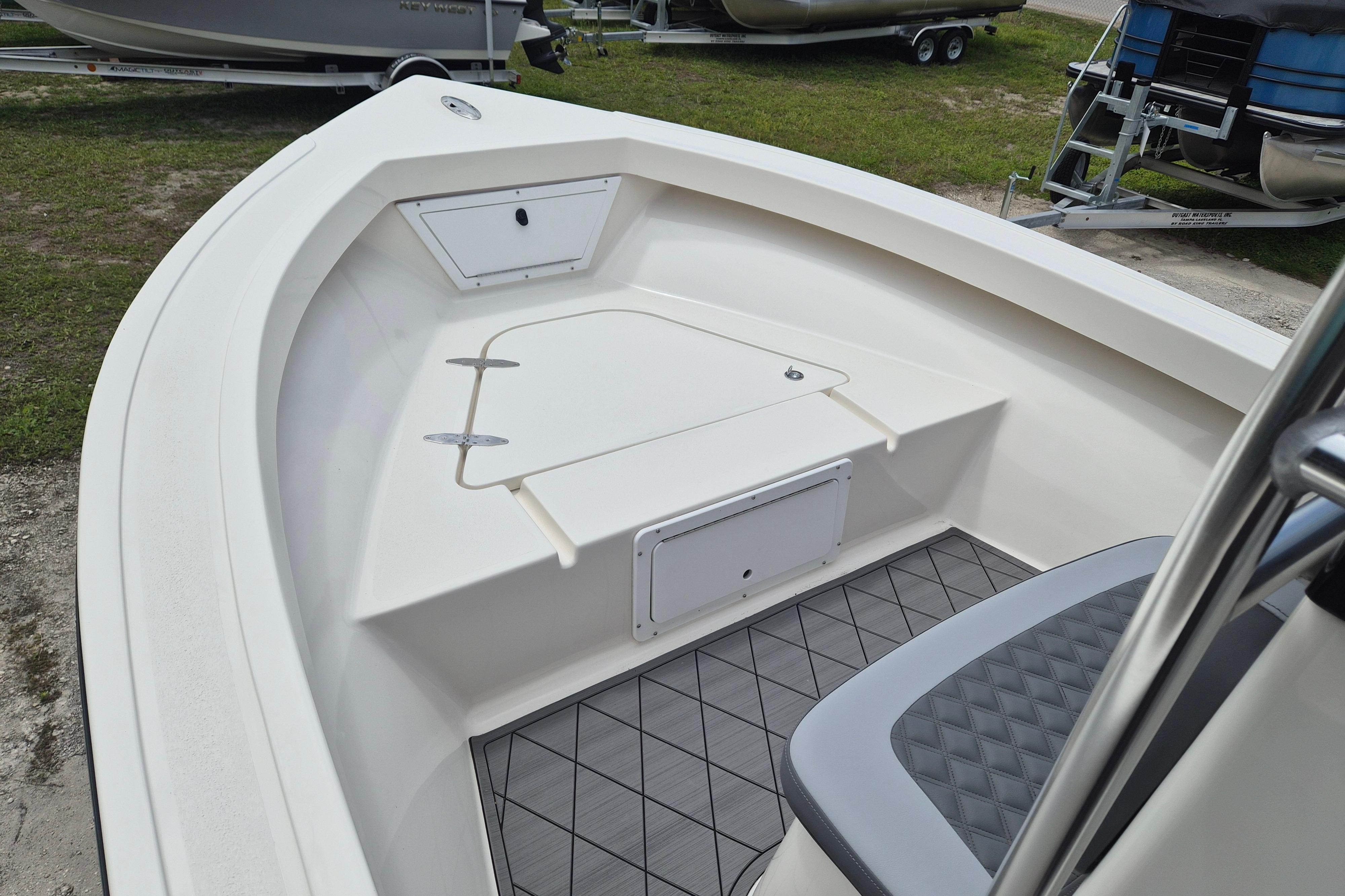 2026 Defiance Catalina 190 boat interior with seating and storage compartments.