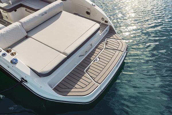 Manufacturer Provided Image: 2025 Sea Ray SDX 250 boat with spacious swim platform on calm water.