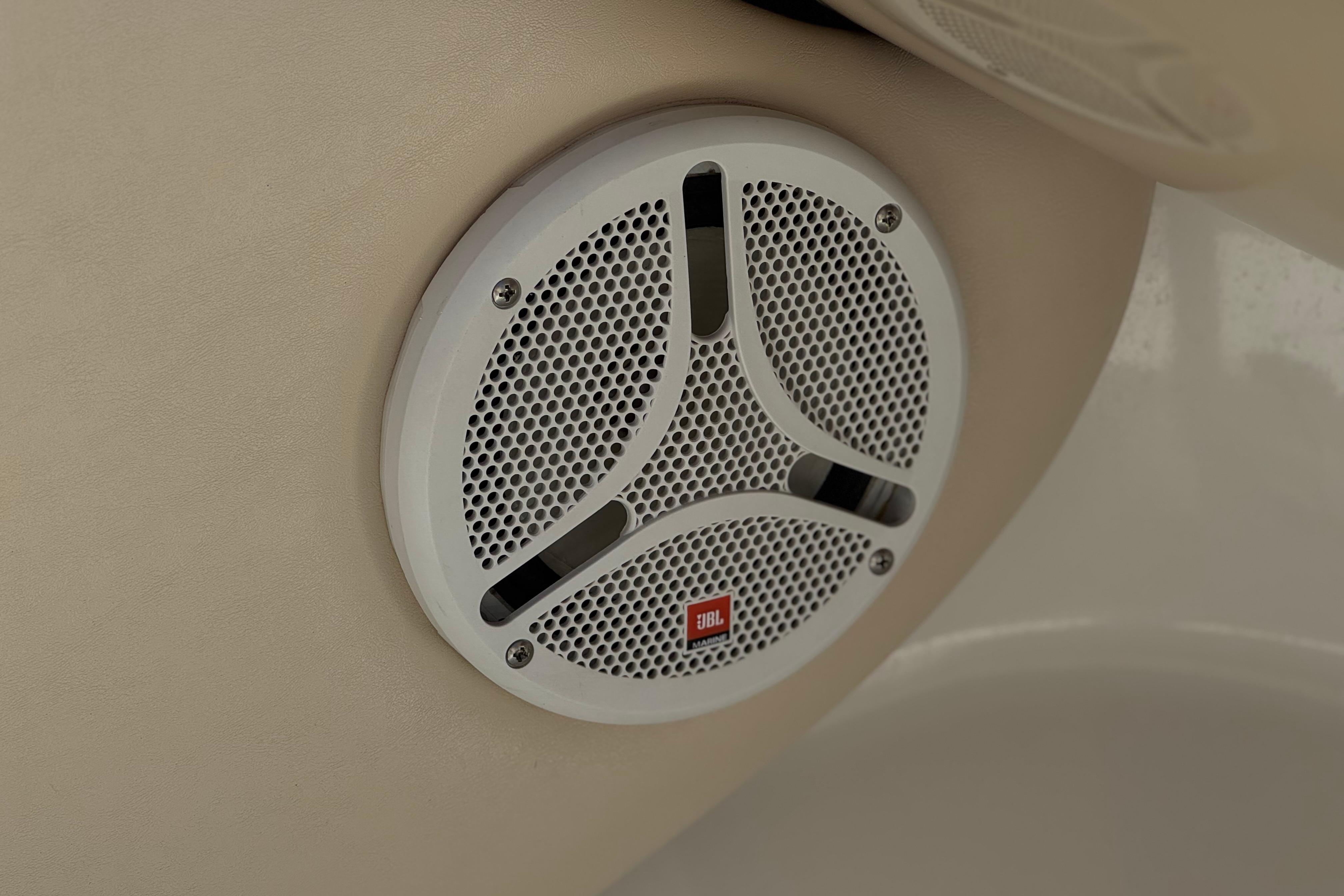 JBL speaker installed in a 2006 Chaparral 190 SSi boat interior.