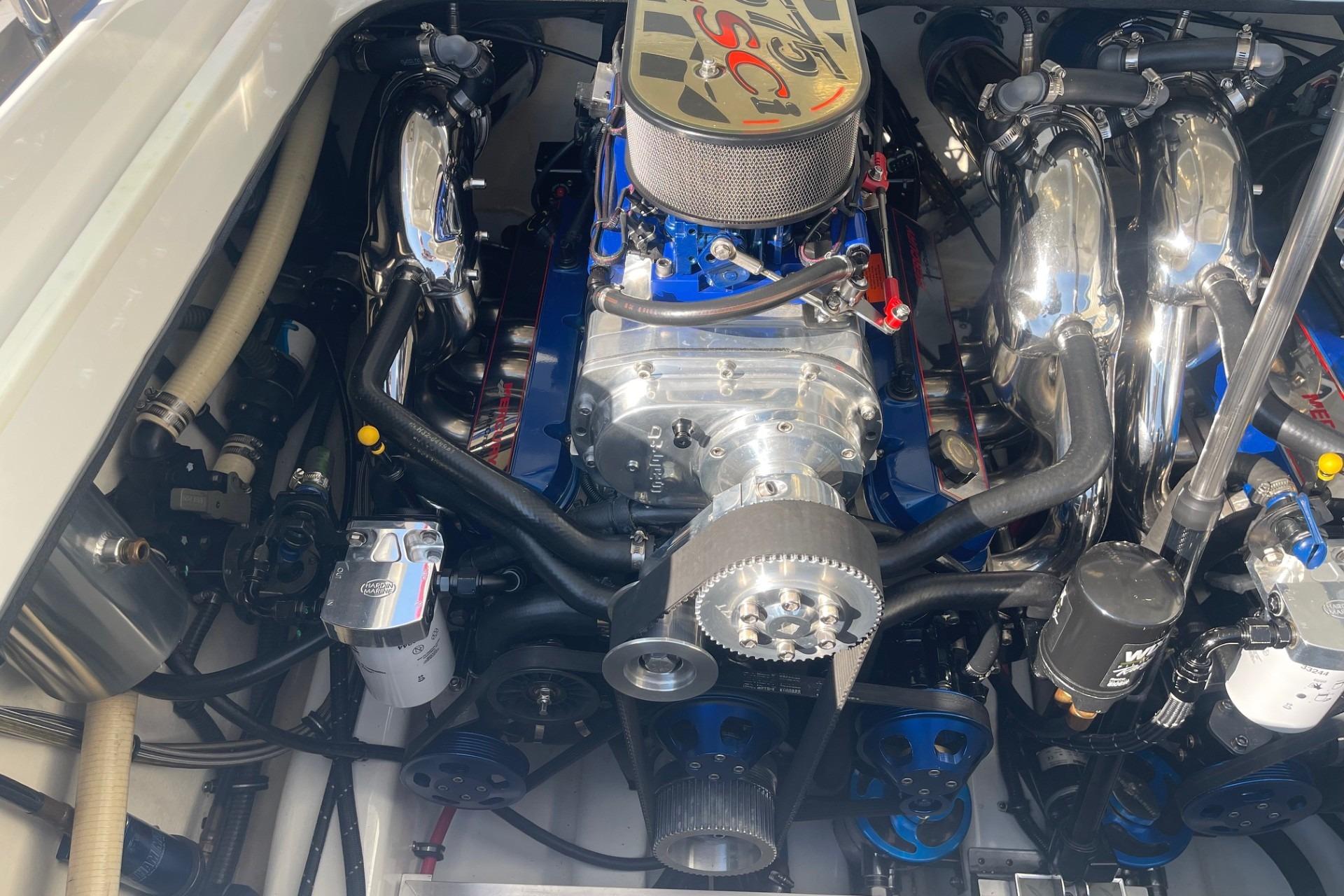 Engine of a 2004 Formula 382 FASTech boat, showcasing detailed components and chrome accents.