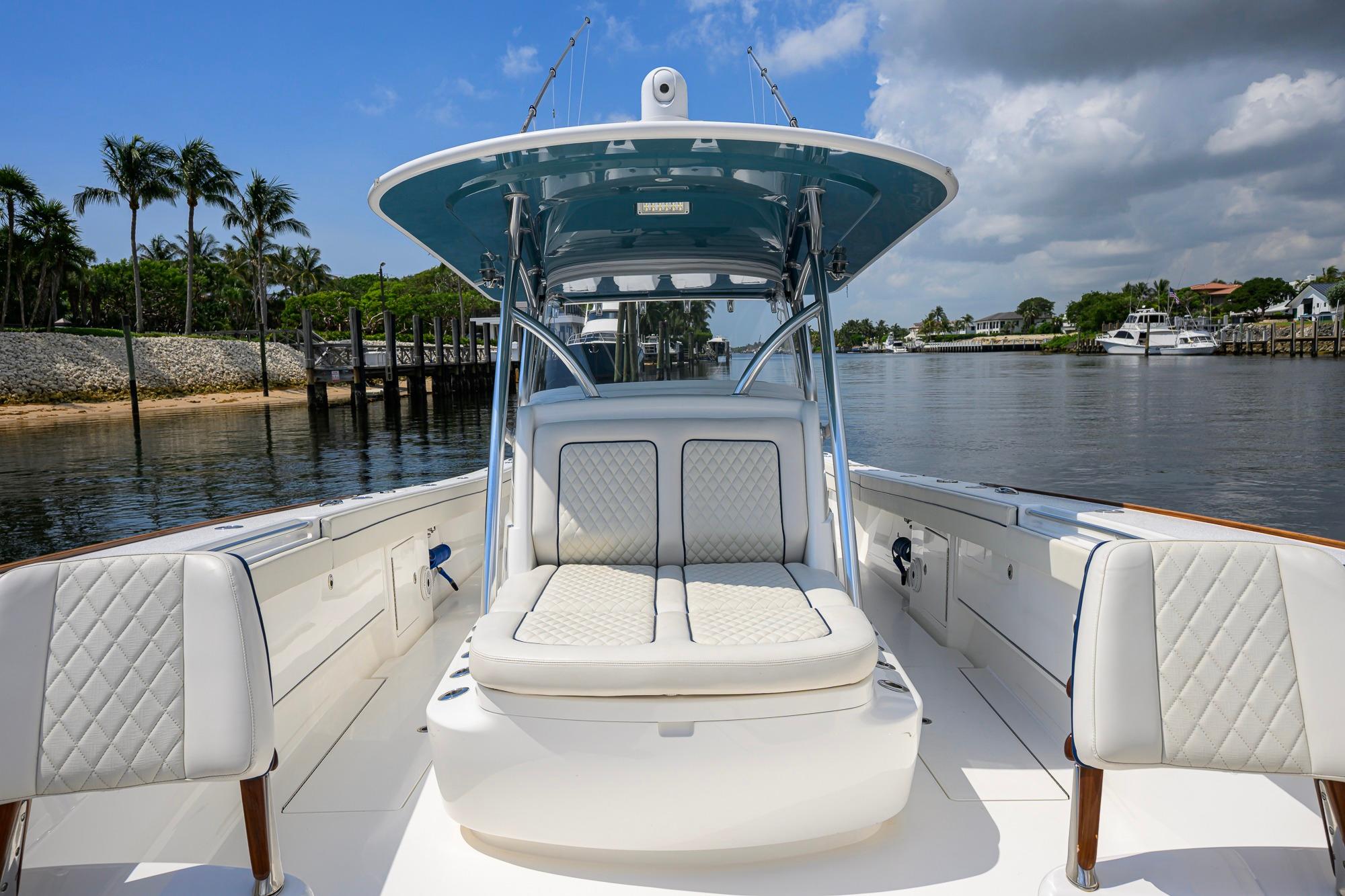 2020 Valhalla Boatworks V-41 on calm water, featuring luxurious seating and sleek design.