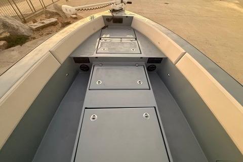 2019 Metal Shark 28 CC boat interior with storage compartments and seating.
