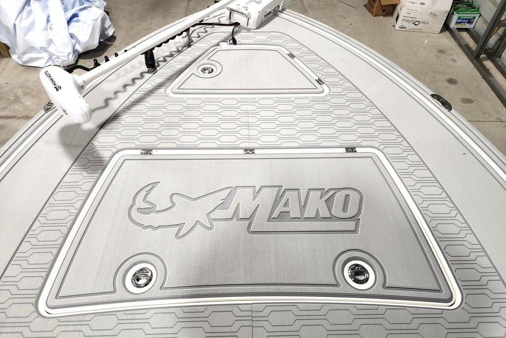 2026 Mako 18 Pro Skiff boat deck with logo and trolling motor.