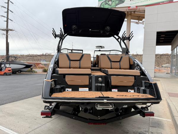 2025 Yamaha Boats 255XD, rear view, showcasing luxurious seating and sleek design.