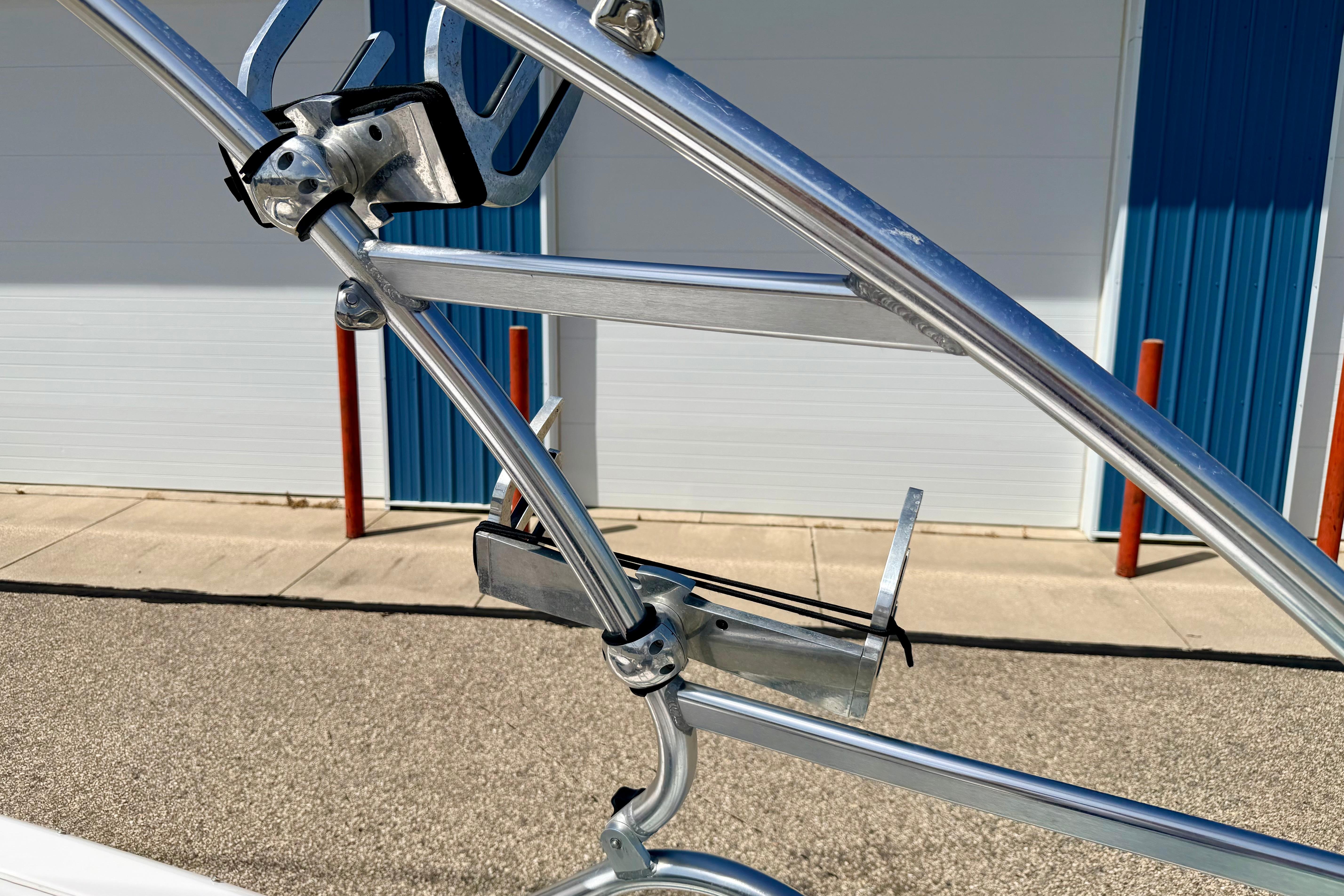 2008 Moomba Outback V boat tower with wakeboard rack, outdoor setting.