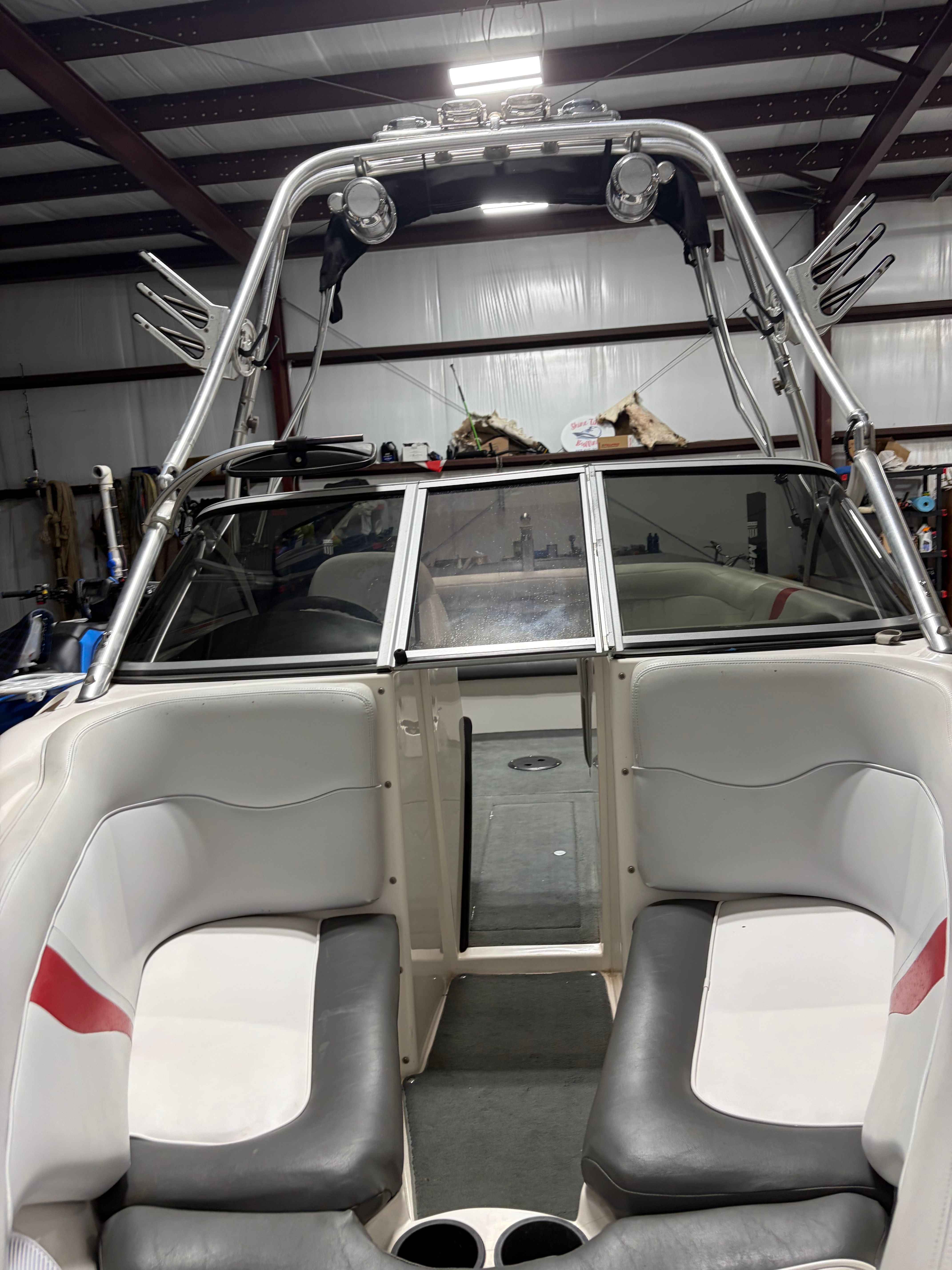 Interior view of a 2004 MasterCraft X2 boat in a storage facility.