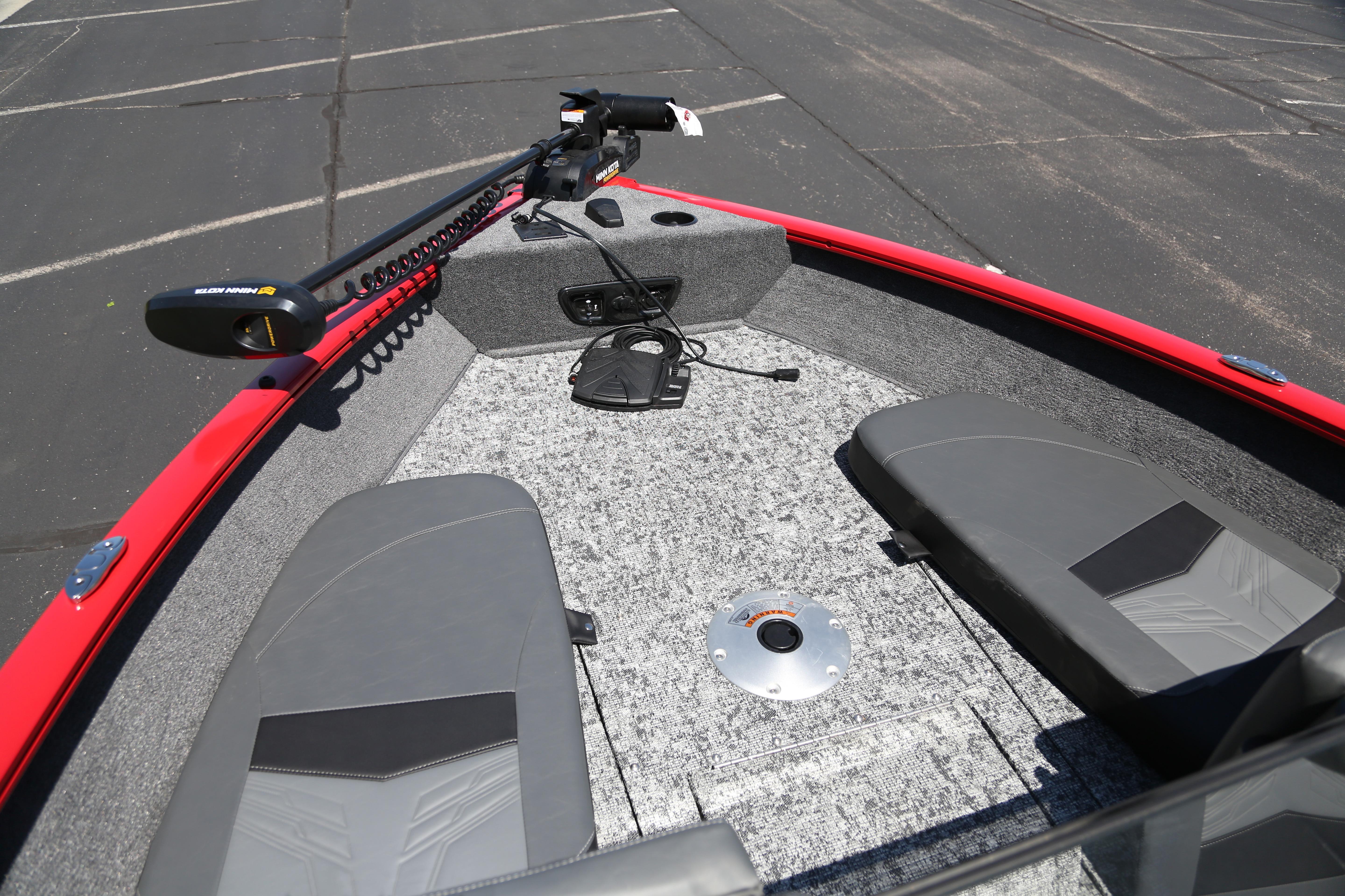 2026 Tracker Pro Guide V-175 Combo boat interior with gray seating and trolling motor.