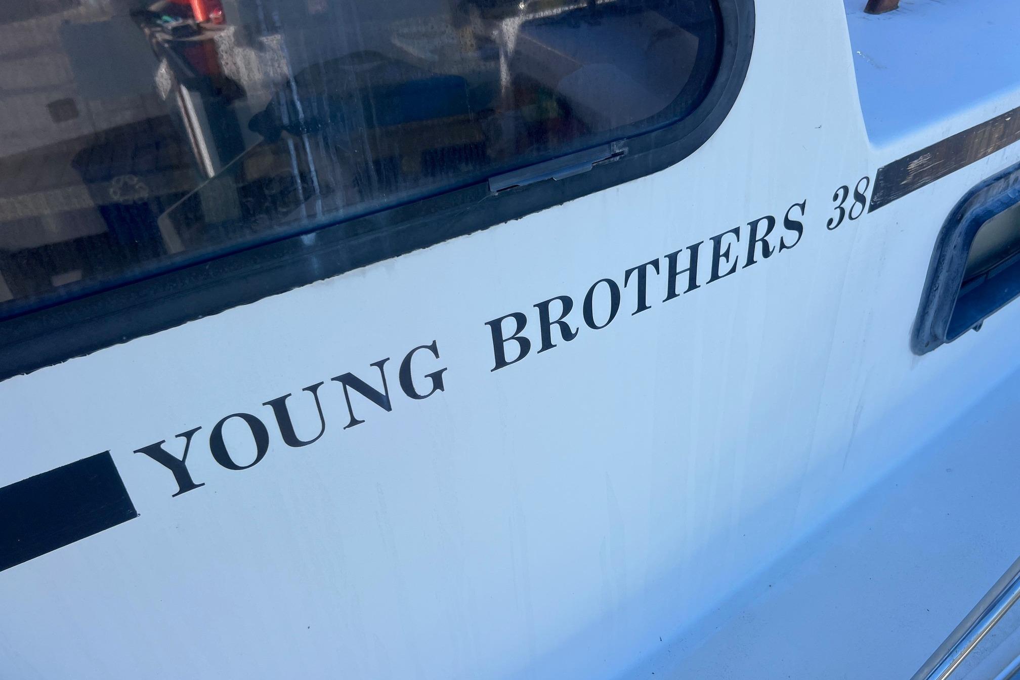 Young Brothers 38 Fly Bridge boat, 1995 model, close-up view of the side.