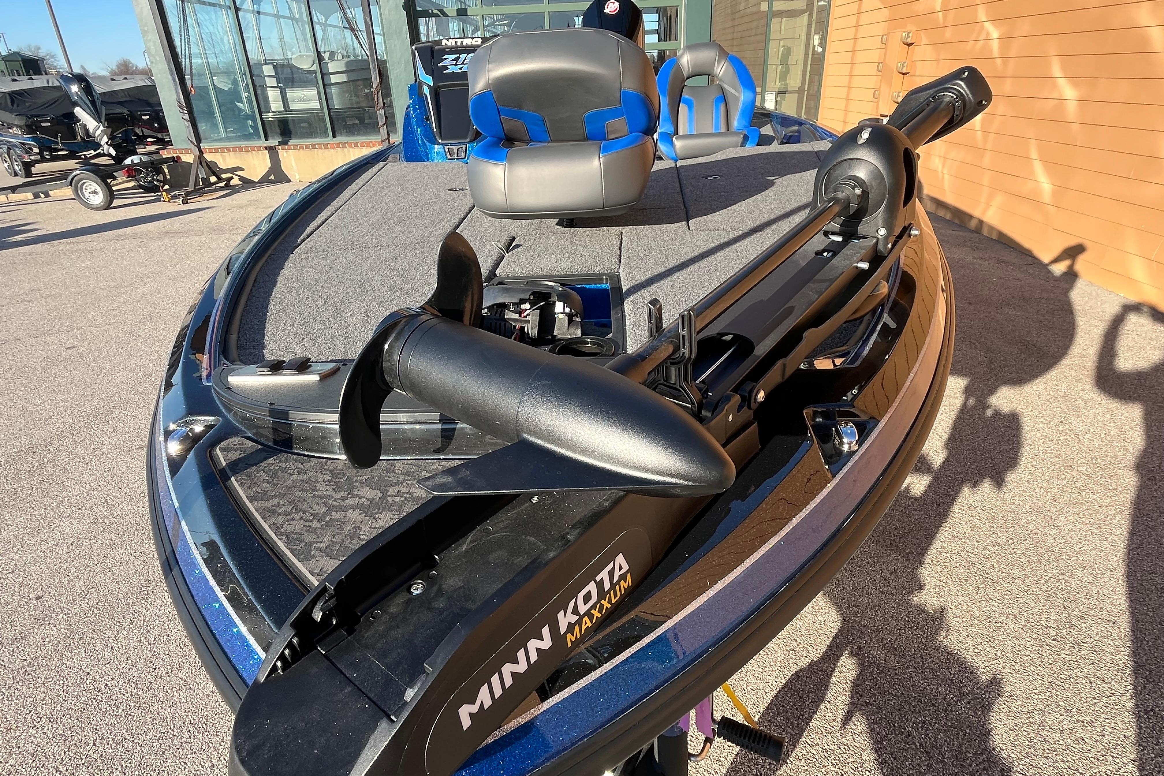 2026 Nitro Z19 XL boat with Minn Kota Maxxum trolling motor, parked outdoors.