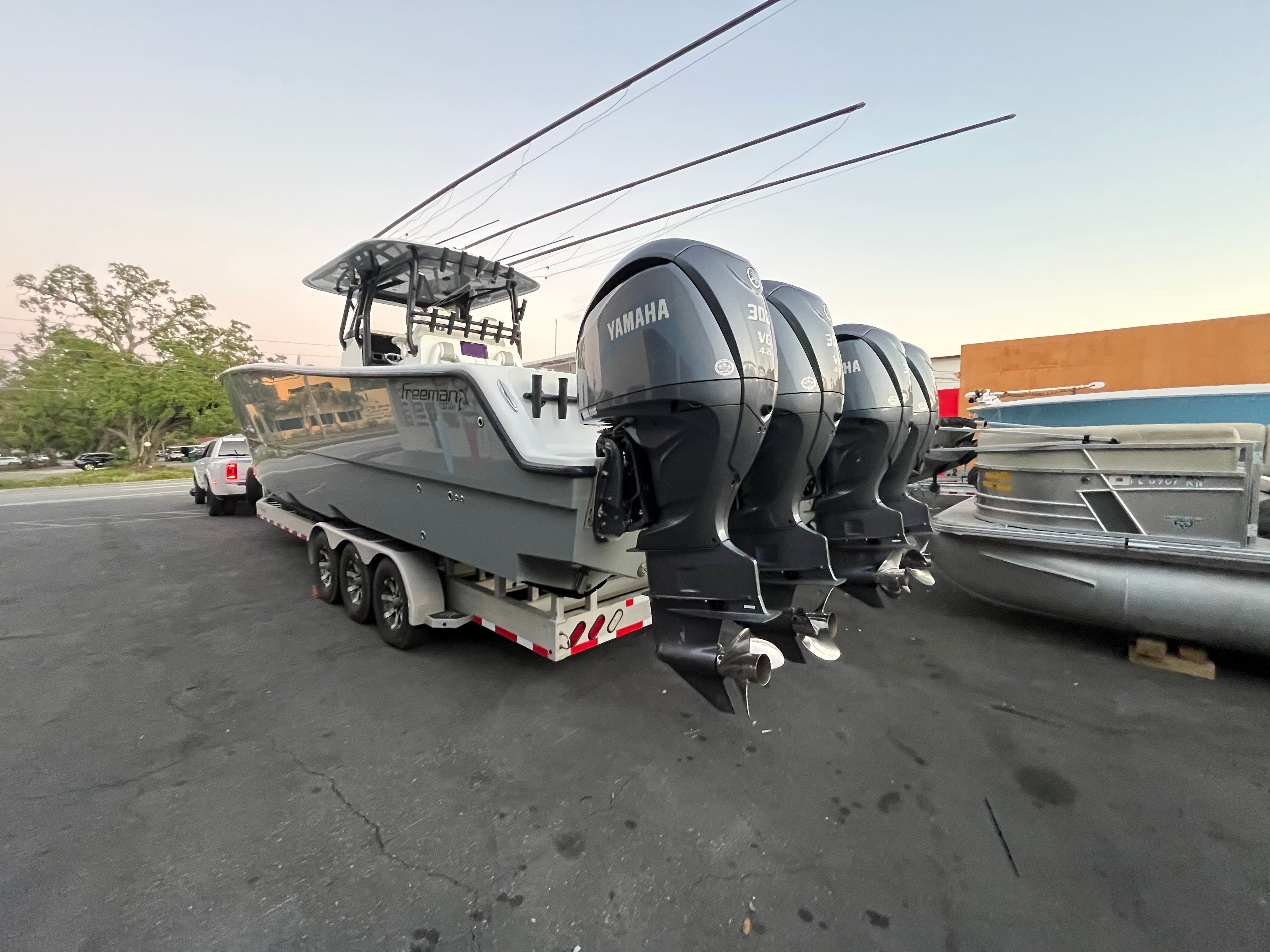 2017 Freeman 37VH boat with four Yamaha outboard engines.