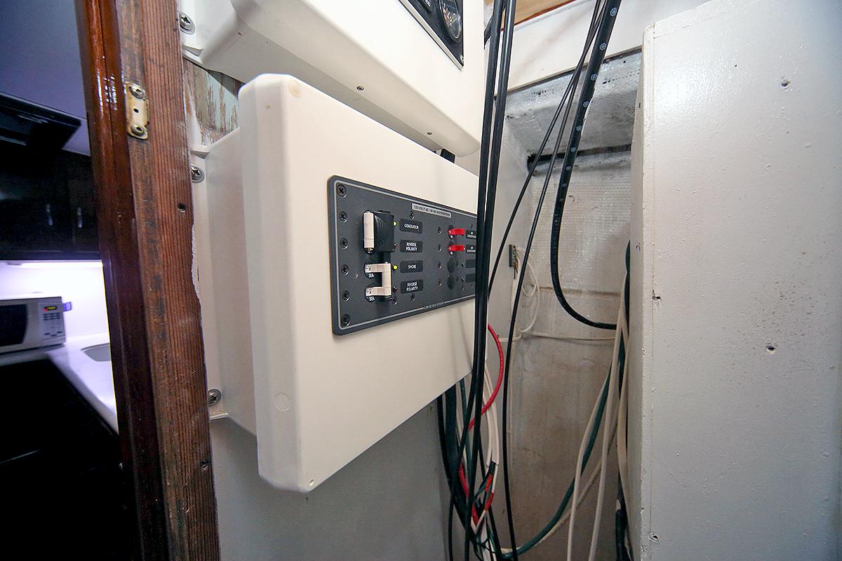 Electrical panel inside a 1971 Hatteras 45 Convertible boat.