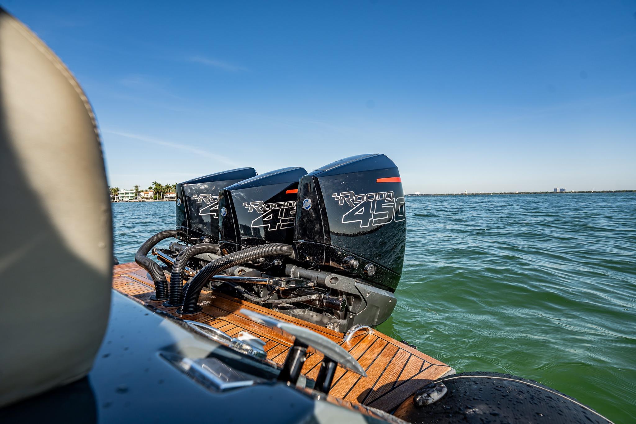 Outboard engines on Skipper-BSK 38NC boat, 2023 model, cruising on open water.